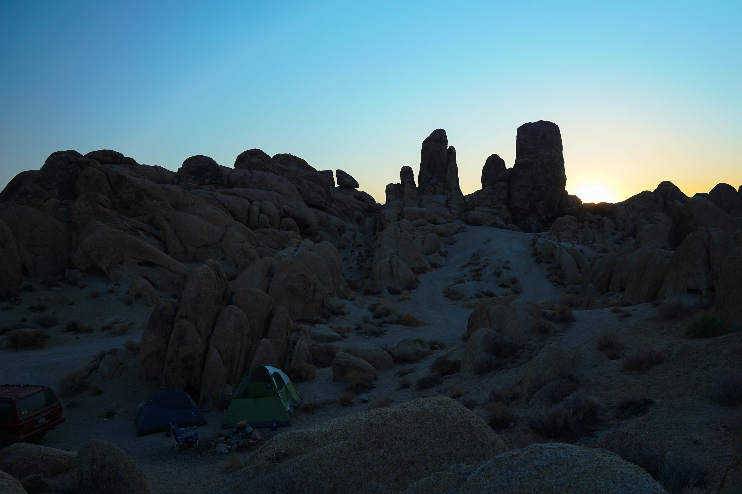 Amidst the Alabama Hills night turns to day as the sun replaces the moon. 