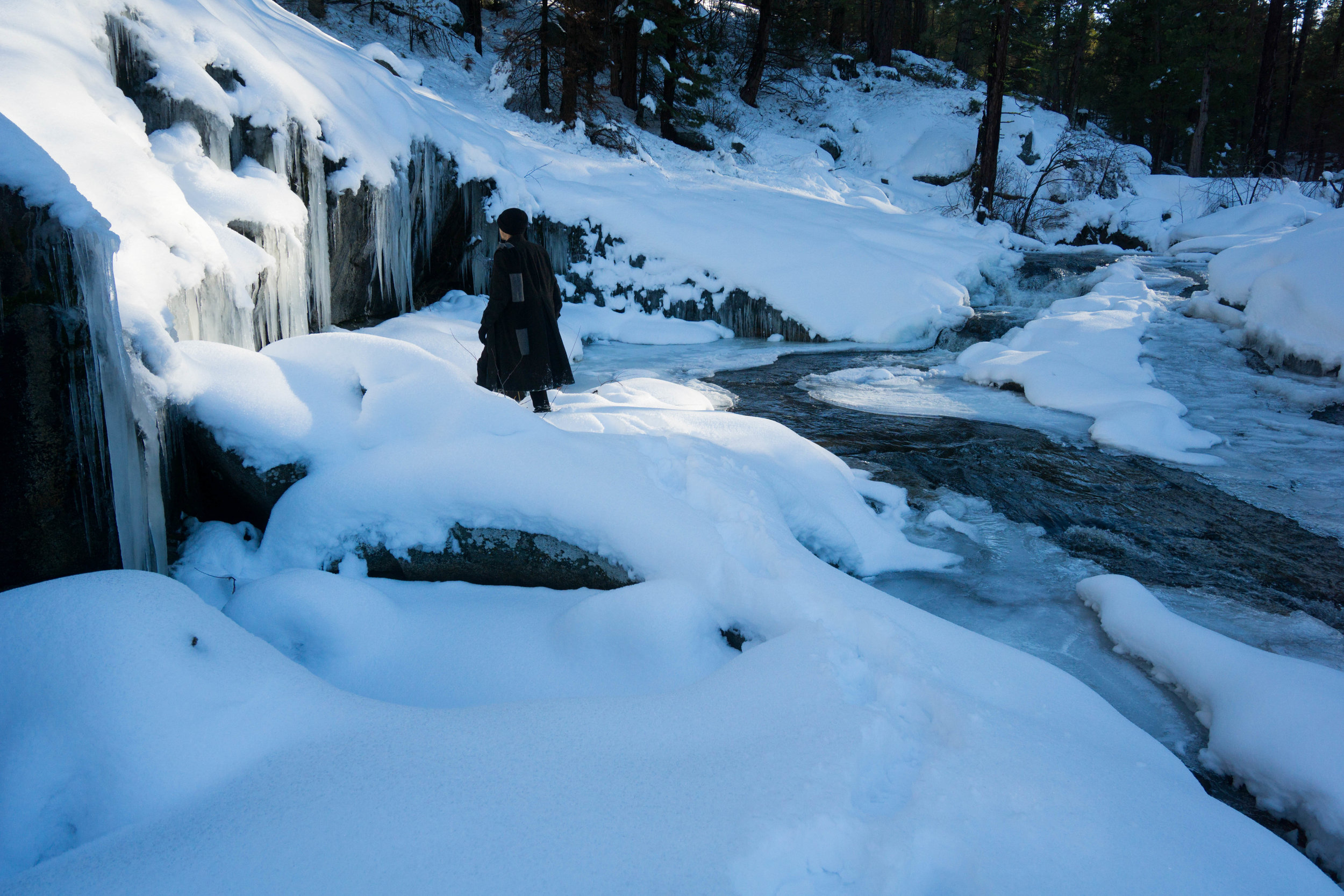 Getting a closer look in these conditions is daunting. Icy granite slides like a hockey rink & 10 foot erosion holes lie hidden under fresh snow.