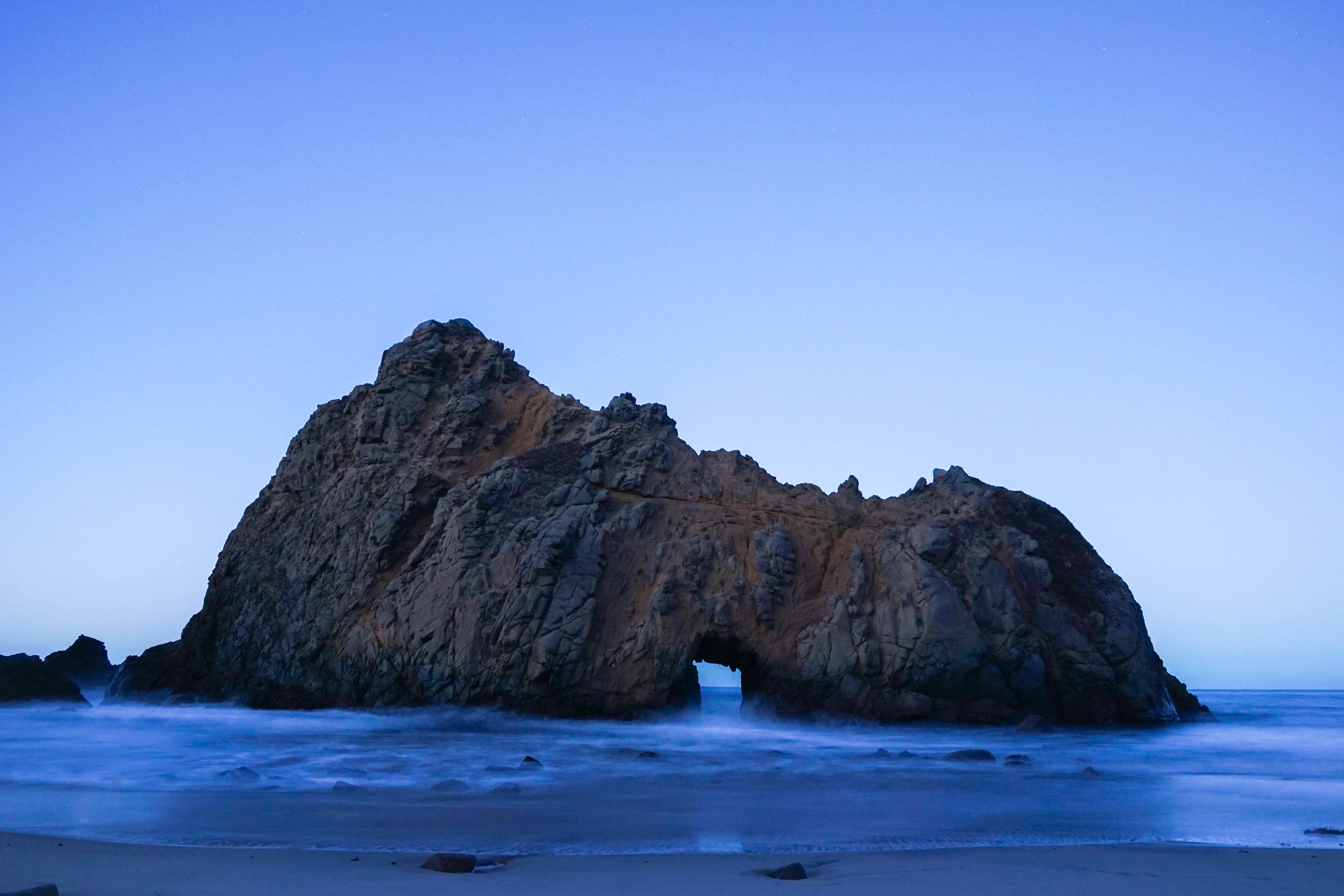 Battered by rough seas, the coastal rock is shaped into a thing of beauty.