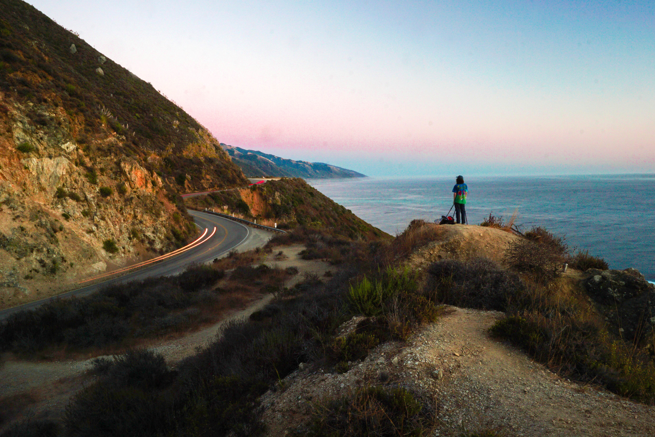 Dylan snapping away pictures of his own high above PCH.