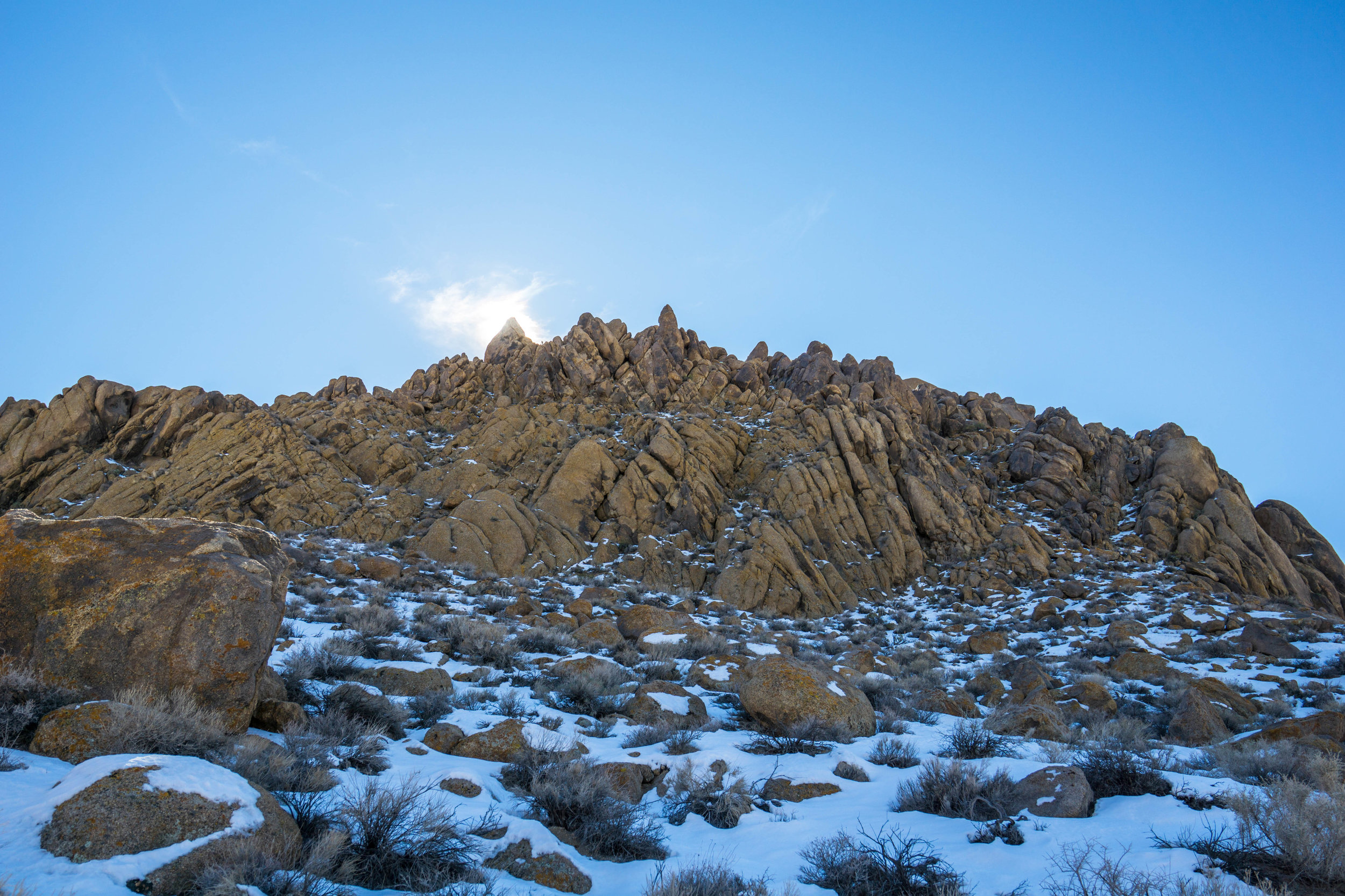 The rocky Alabama Hills are normally free of snow, but a late winter storm created a beautifully rare contrast.