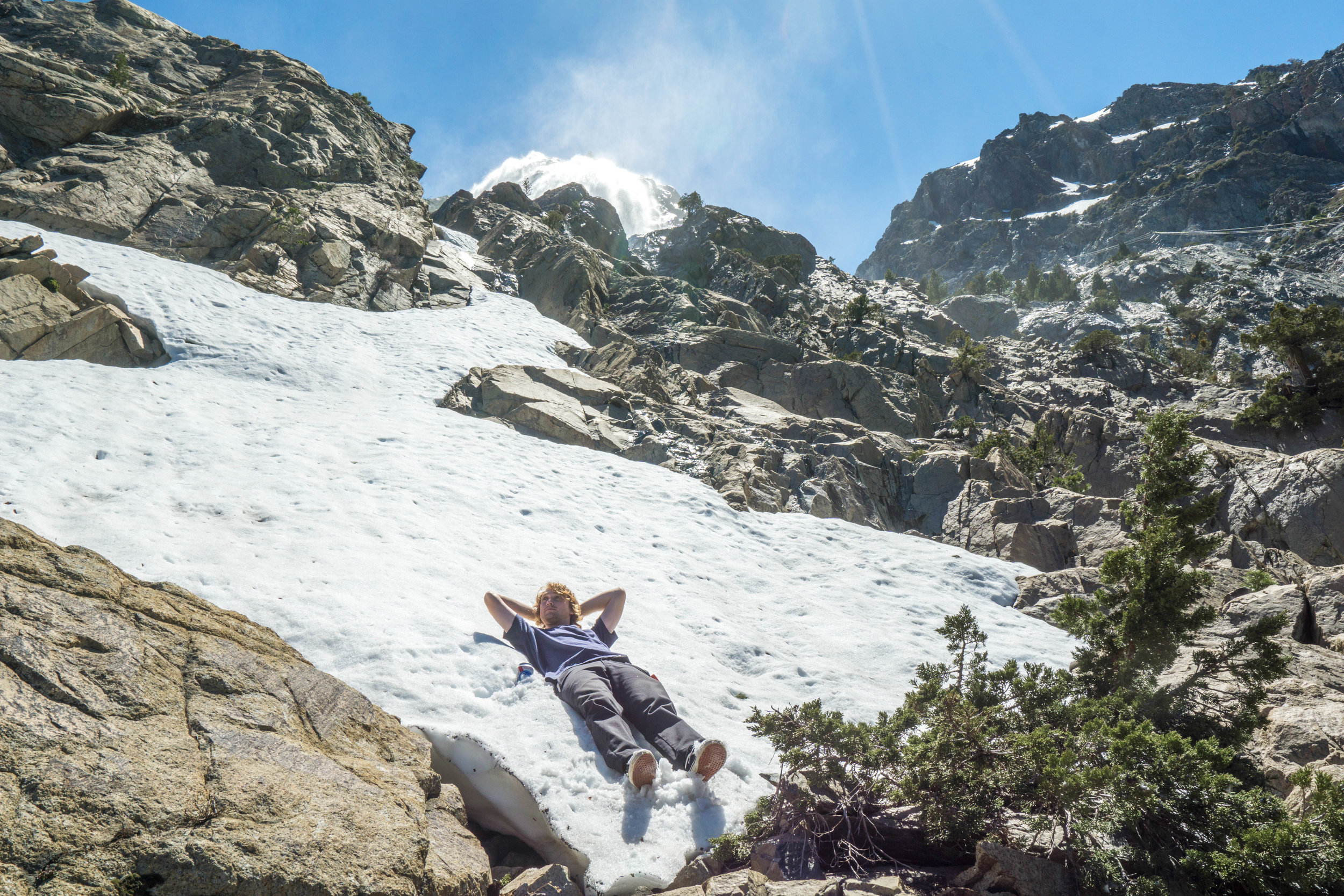 The noon-day sun had us cooking, so a mid-hike snow patch provided the ultimate cool down.