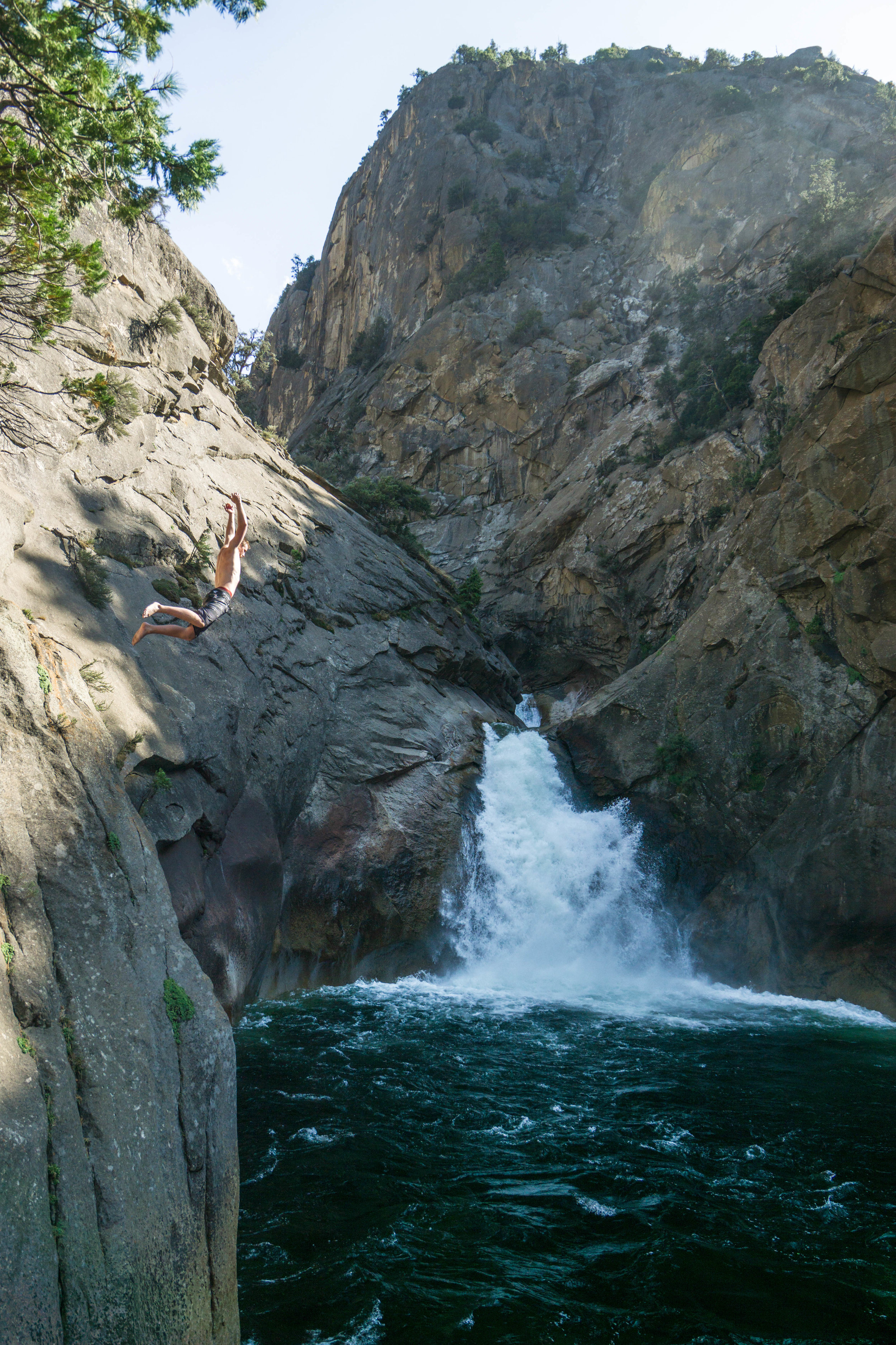 Jump after jump, we leap into the icy waters amid the torrent sound of the falls.