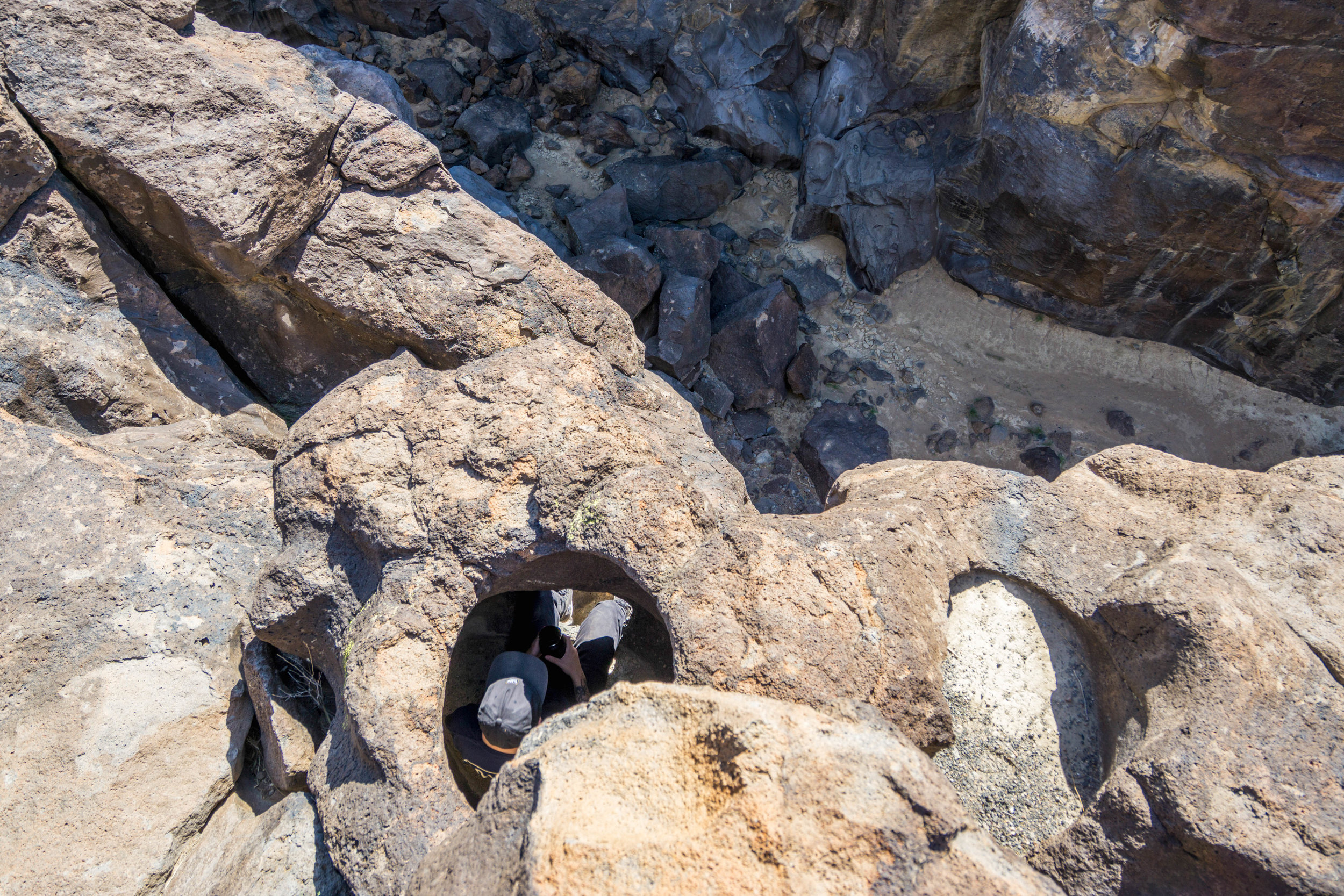 Perfect circles shaped by whirlpool-like water erosion created a fun opportunity to climb inside the rocky capsule.