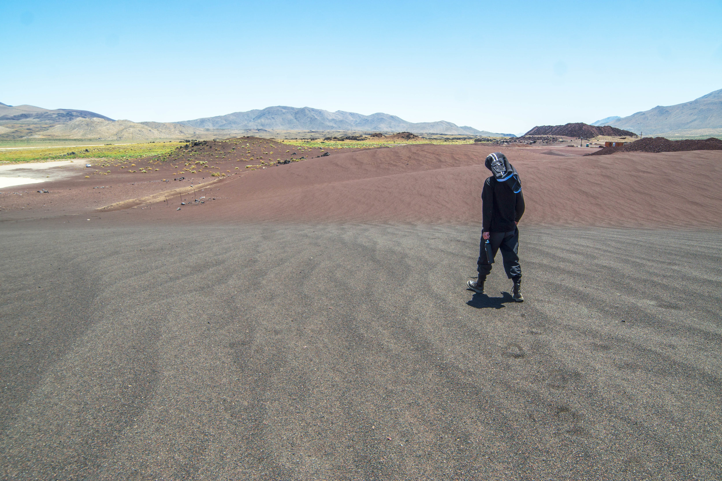 Like an alien planet, it has mars red &amp; black sand dunes.