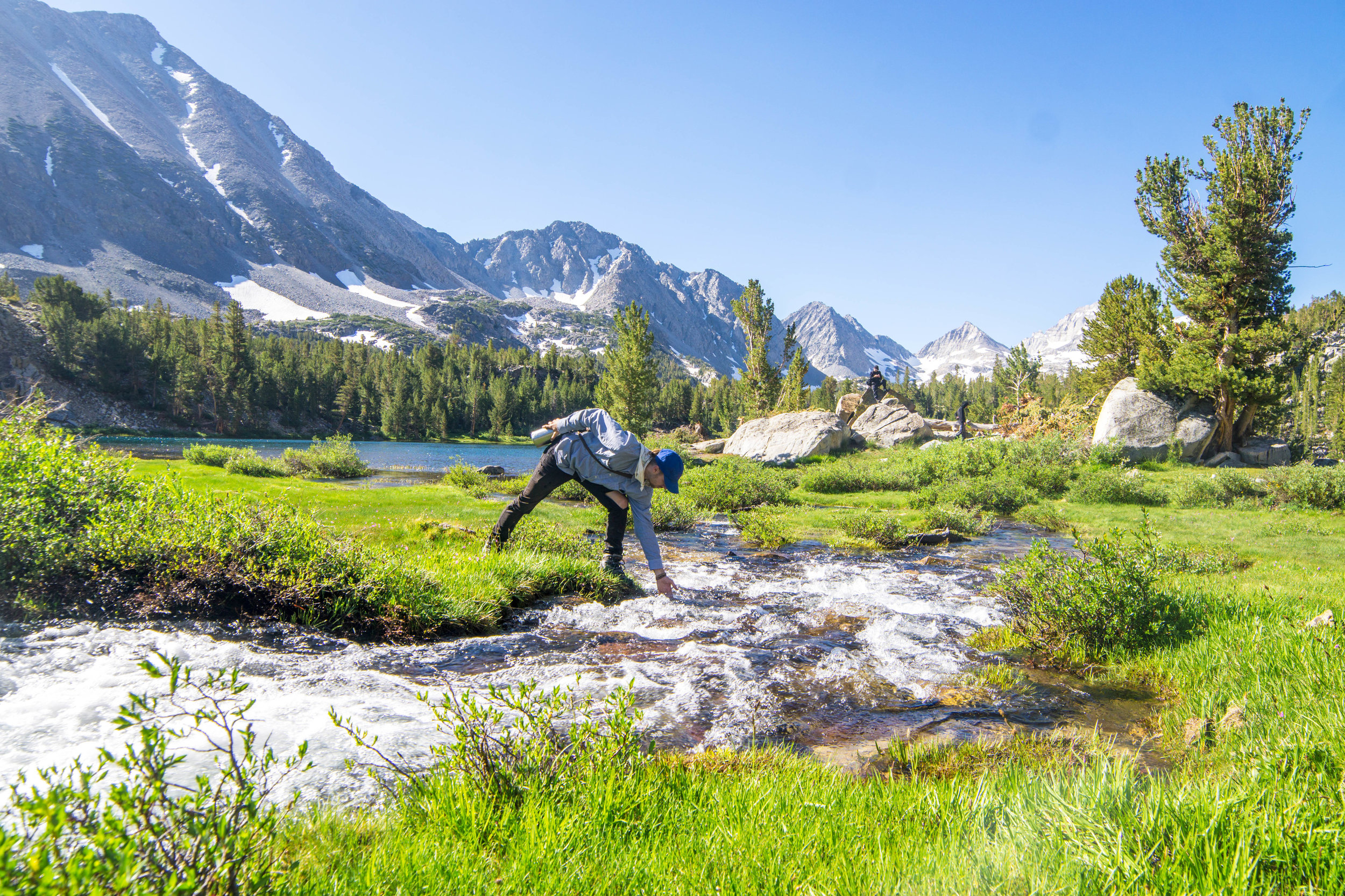 But like a scene out of Switzerland, lush meadows cut by alpine streams were rimmed by snowcapped peaks. The beautiful scenery made the battle with the mosquitos well worth it.