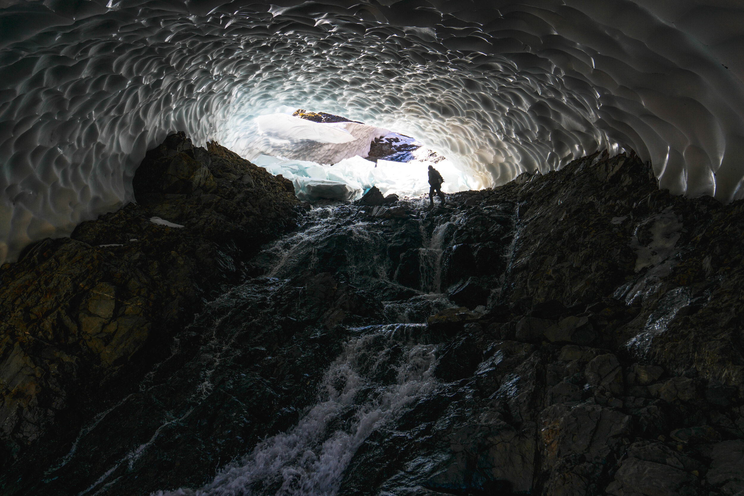 As the waterfall rushed under a roof of turquoise ice, the feeling was both inspiring &amp; nerve-racking. Large sections of the cave had already collapsed.