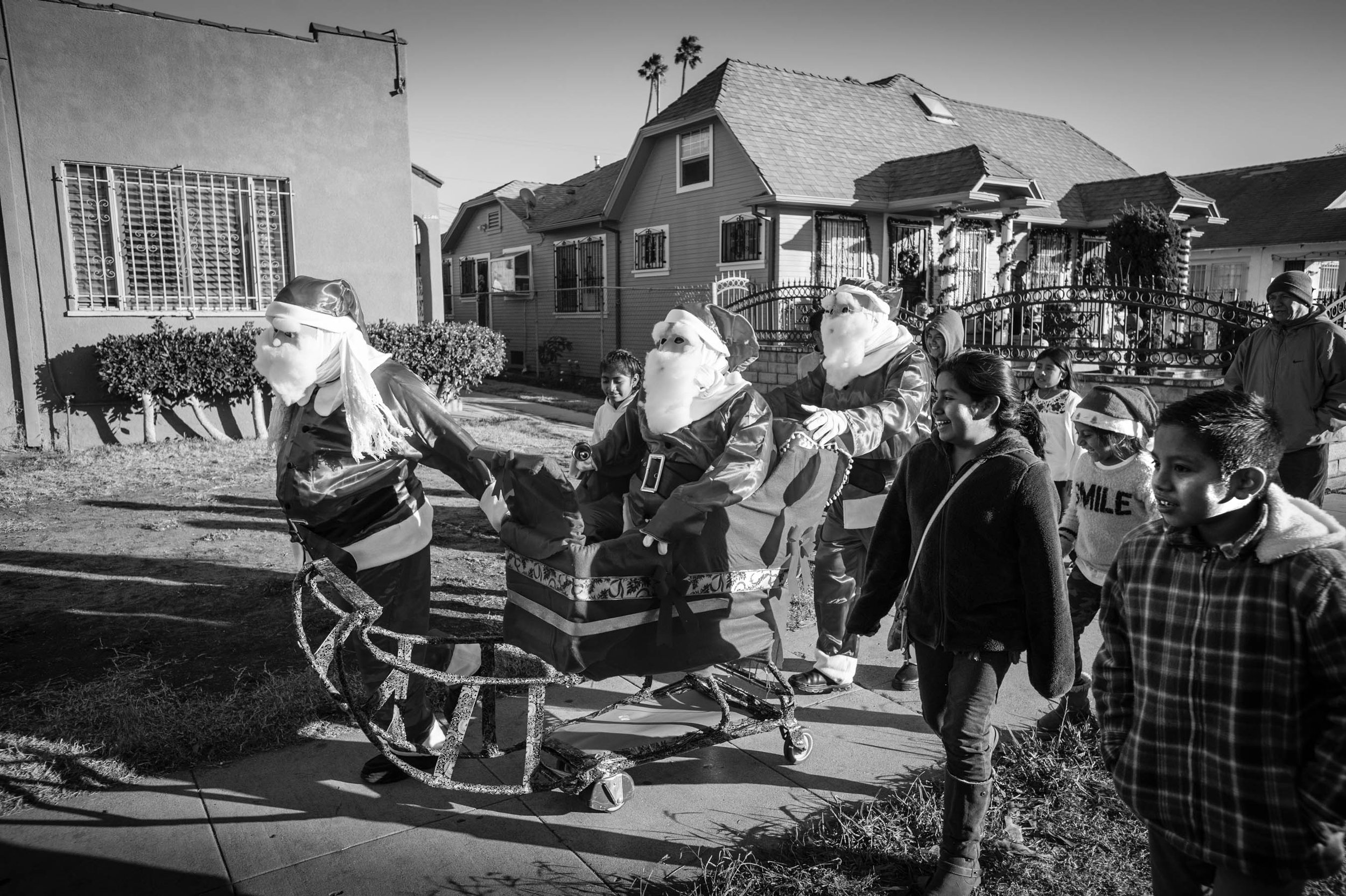  Familia Zapoteca arrives as Santa Claus at Chirstmas celebration in Los Angeles. 