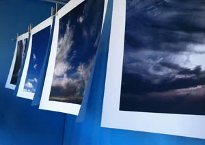 Paper clouds, hanging on a line in a Pt Townsend, WA store window. Just for fun, and because Pt. Townsend can always use a few more blue skies too.