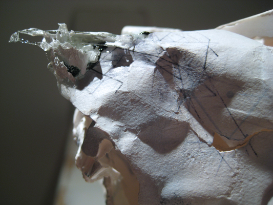 Cast porcelain, ceramic decals, epoxy, white-out