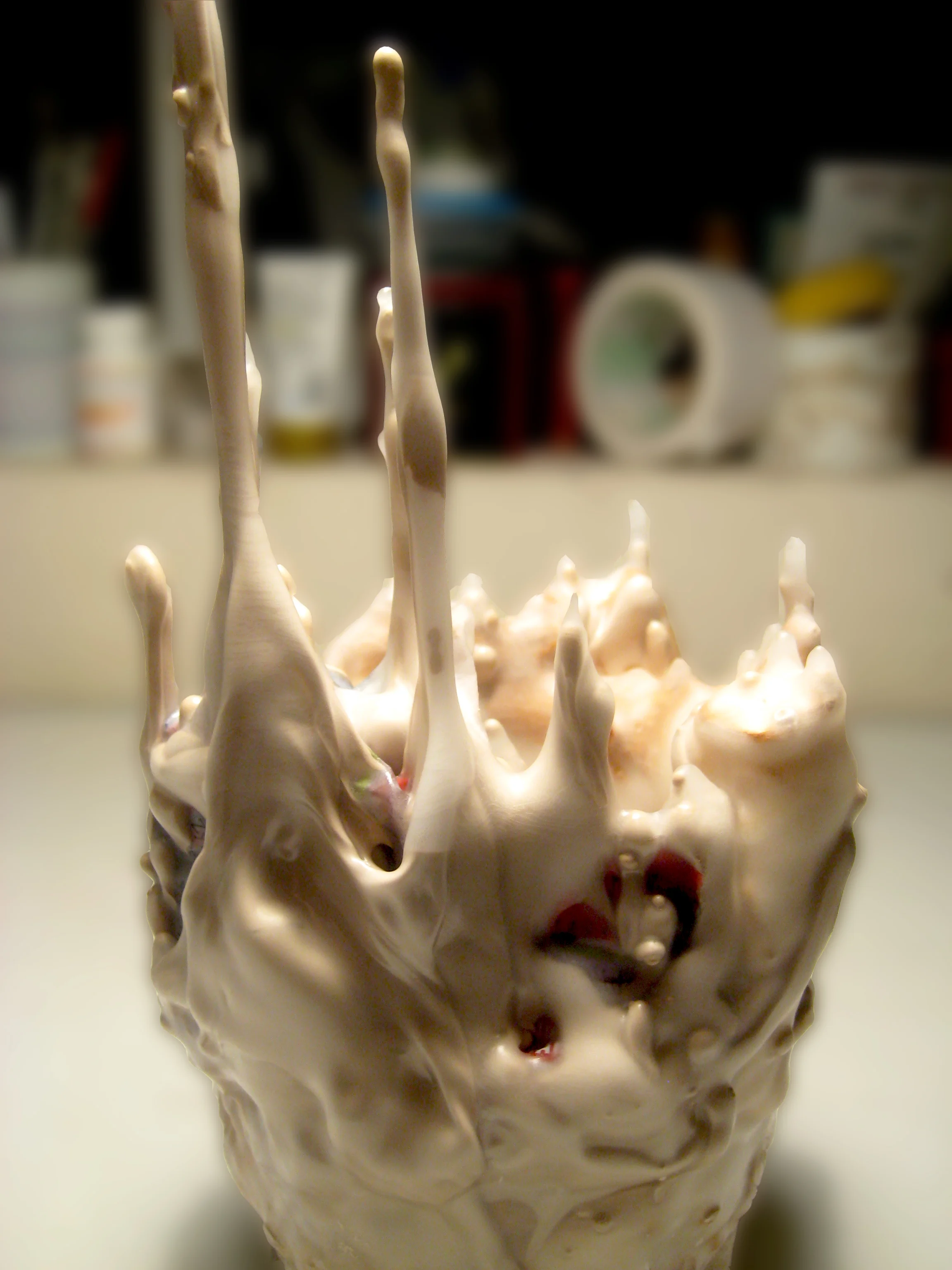 Found objects, casting slip, aluminum foil, wax