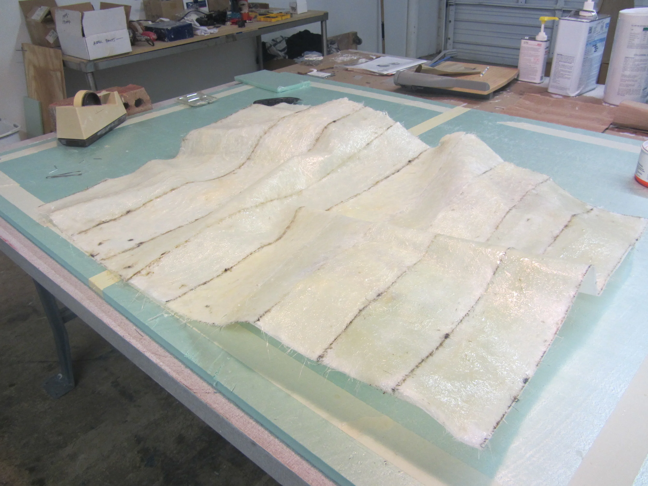 Crumpled acetate, reinforced with epoxy, foam, and fiberglass cloth.
