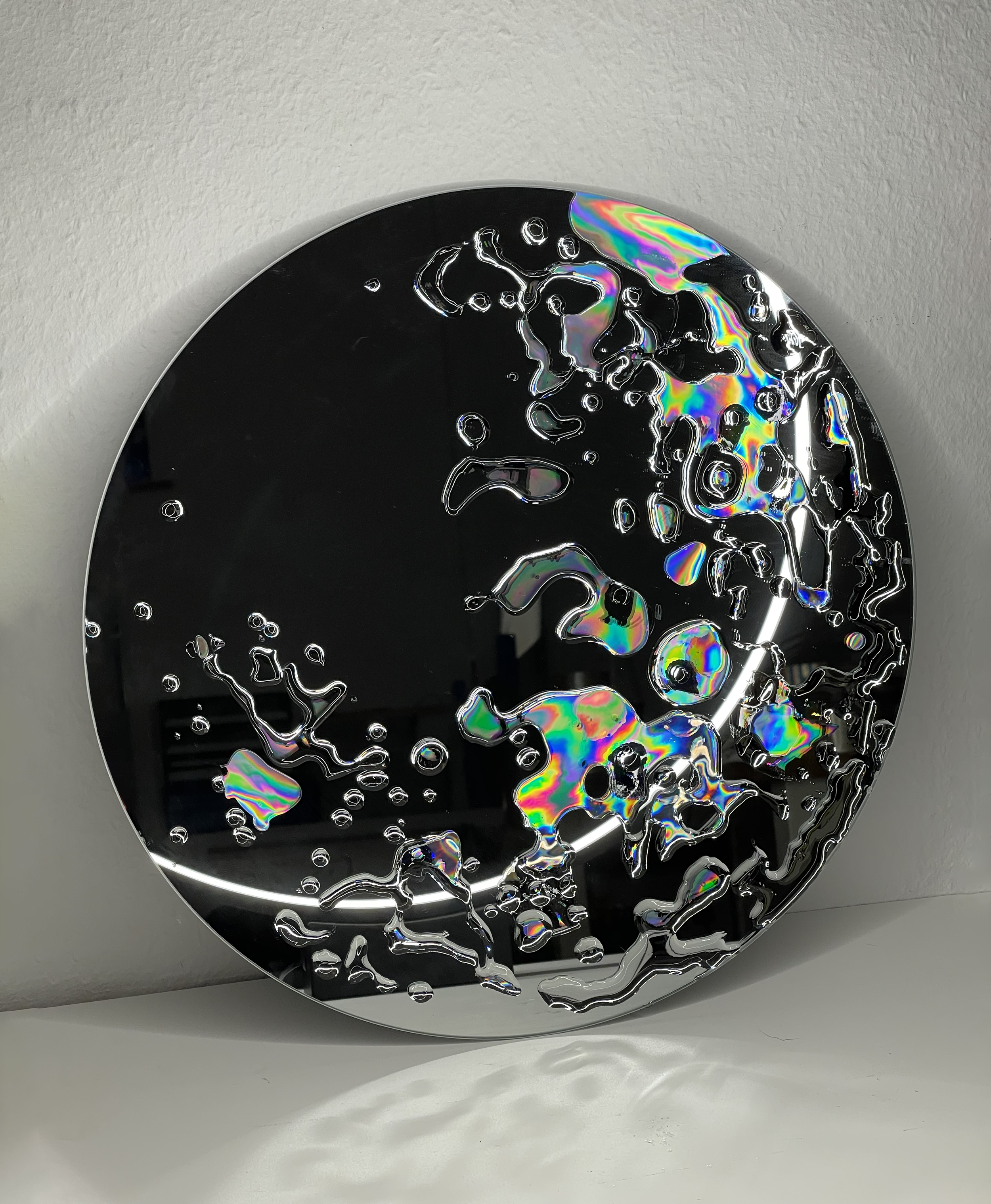  Chromazoa I, 2021. Mirror, UV resin.    40cm diameter 