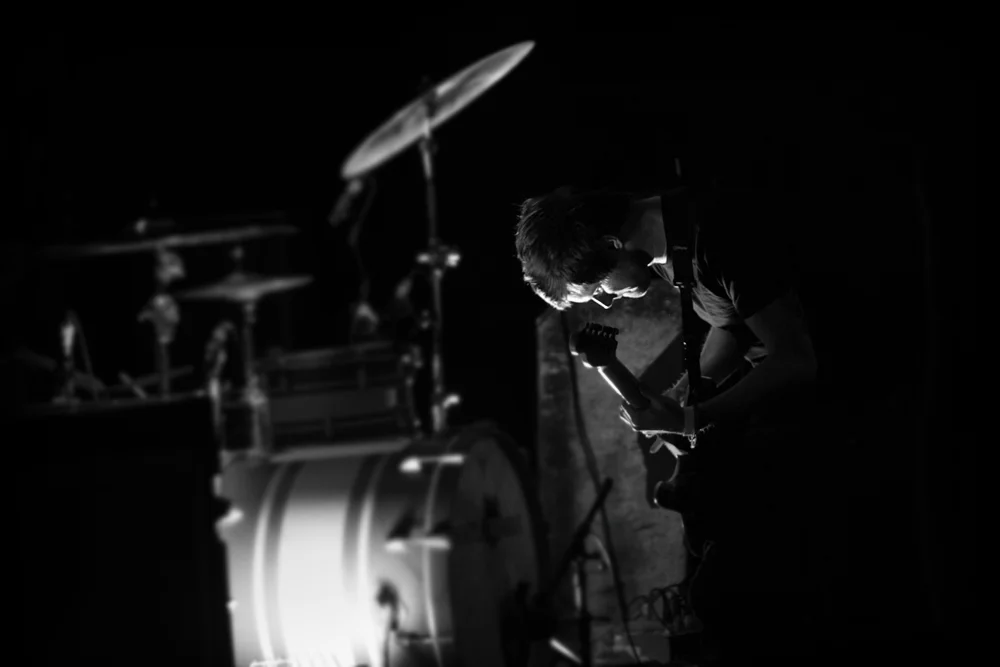 Taken on an older version of the Canon EOS Rebel with a 50mm f/1.8 at one of the first shows that I photographed. 