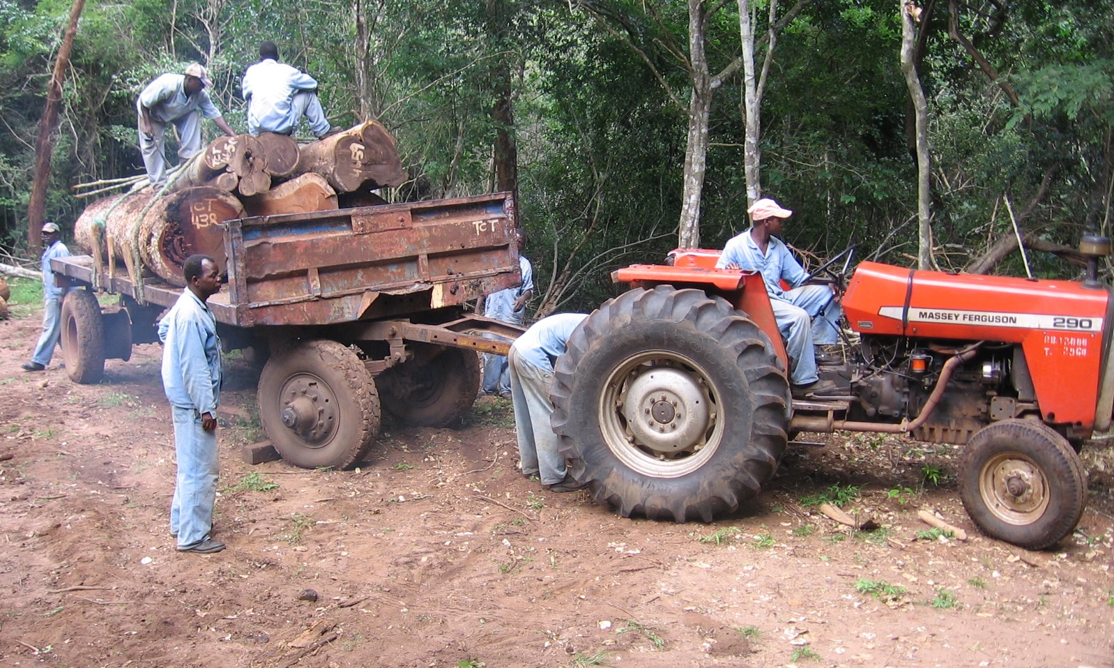 Transportation using tractors and trailers to prevent heavy trucks entering