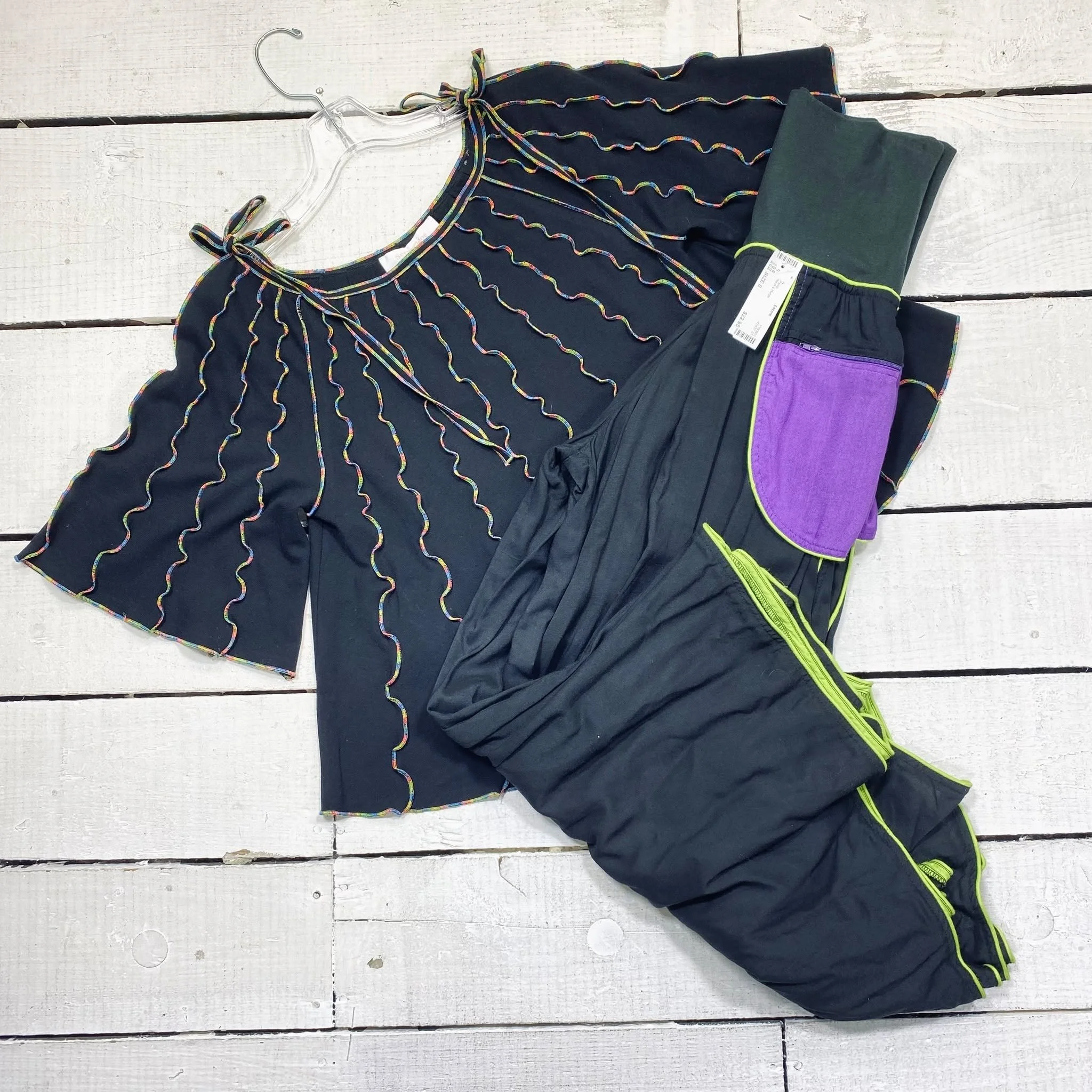 See By Chloe Top Size L, $45.95
Pants Size 0, $22.95