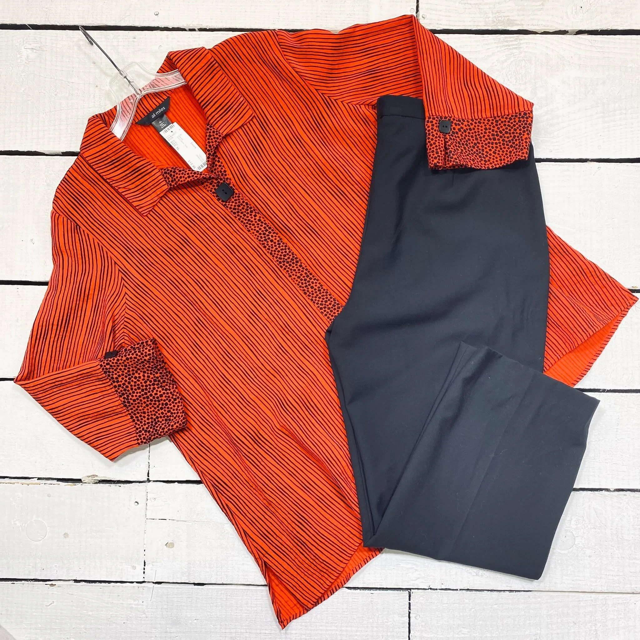 Ali Miles Blouse Size XL, $15.95
Escada Pants Size 16, $24.95