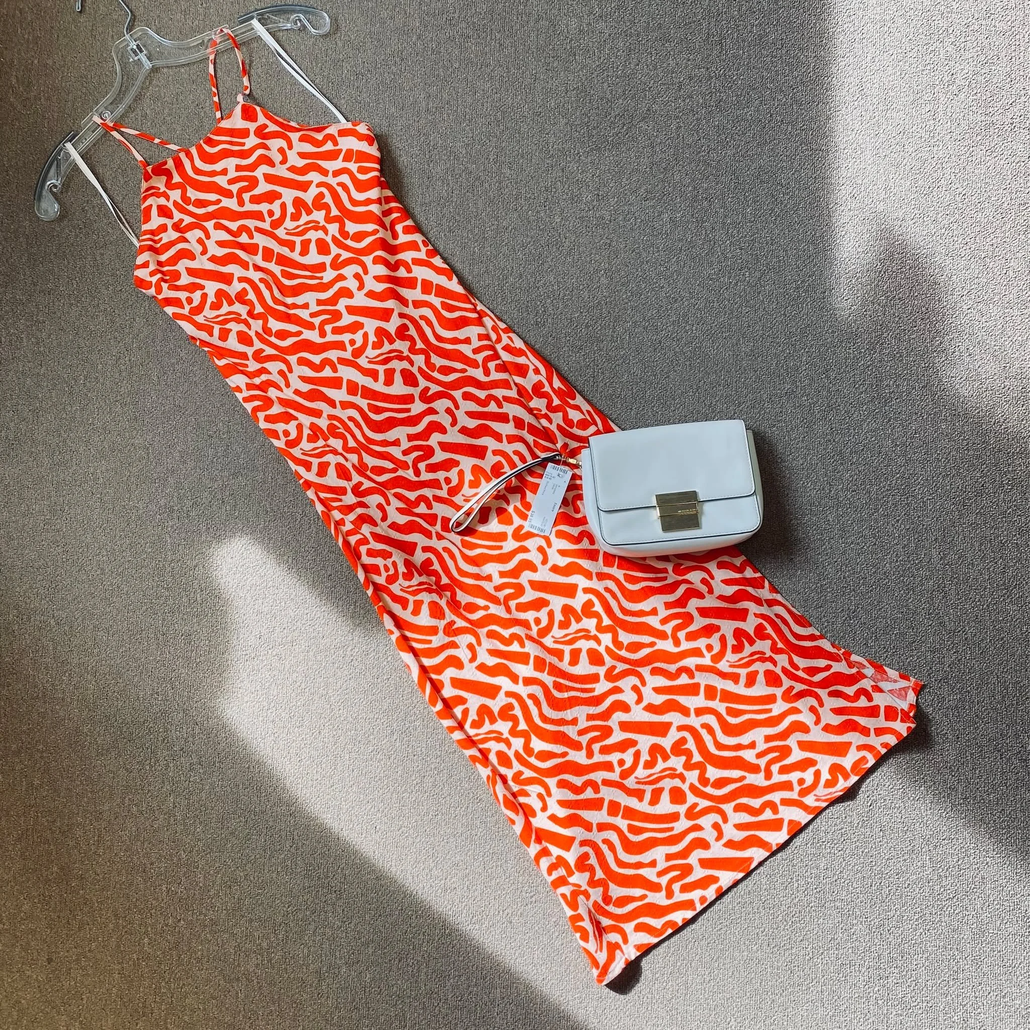 Dress Size 4, $20.95
Michael Kors Wristlet, $38.95