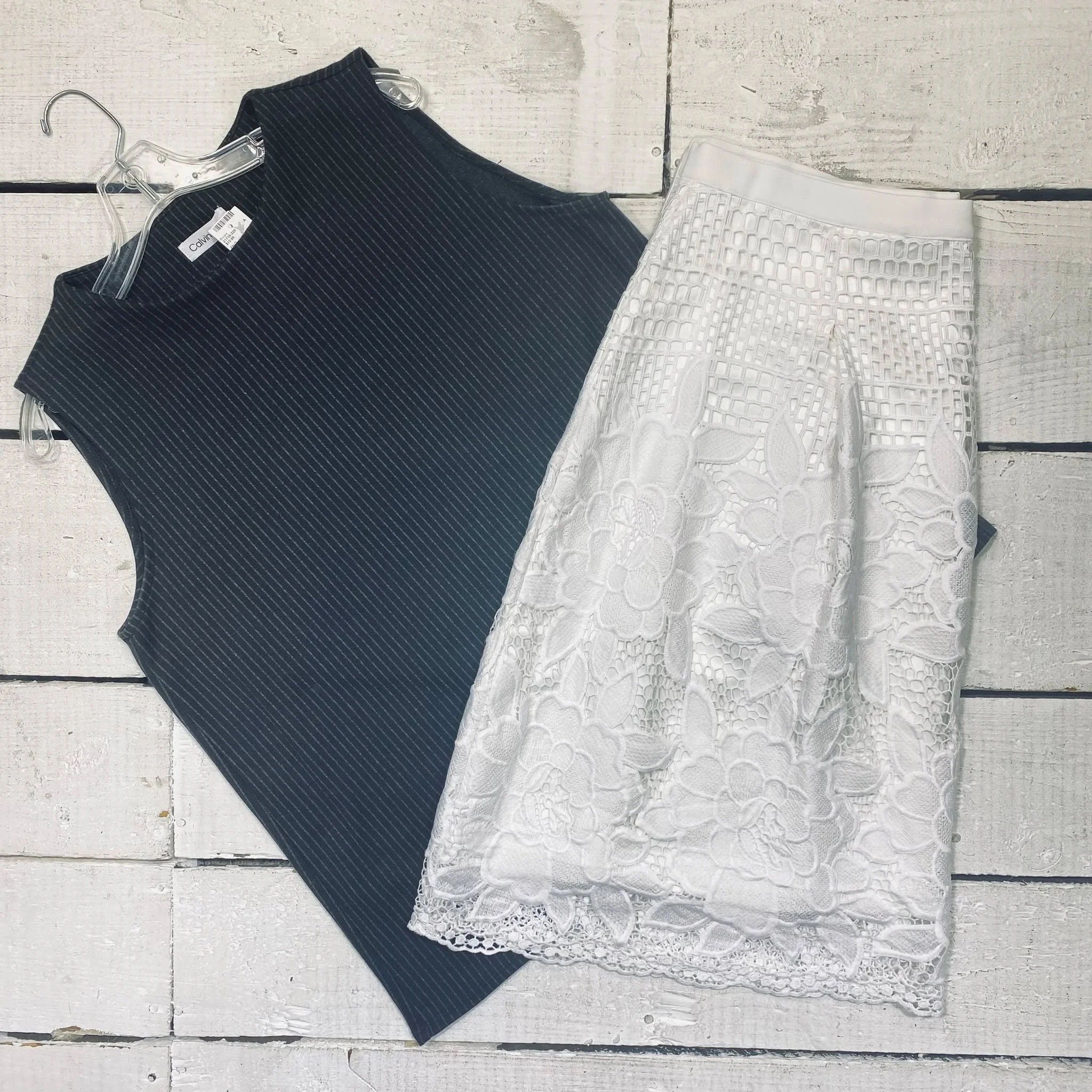 Calvin Klein Shell Size XL, $10.95
Isaac Mizrahi Skirt Size 16, $15.95