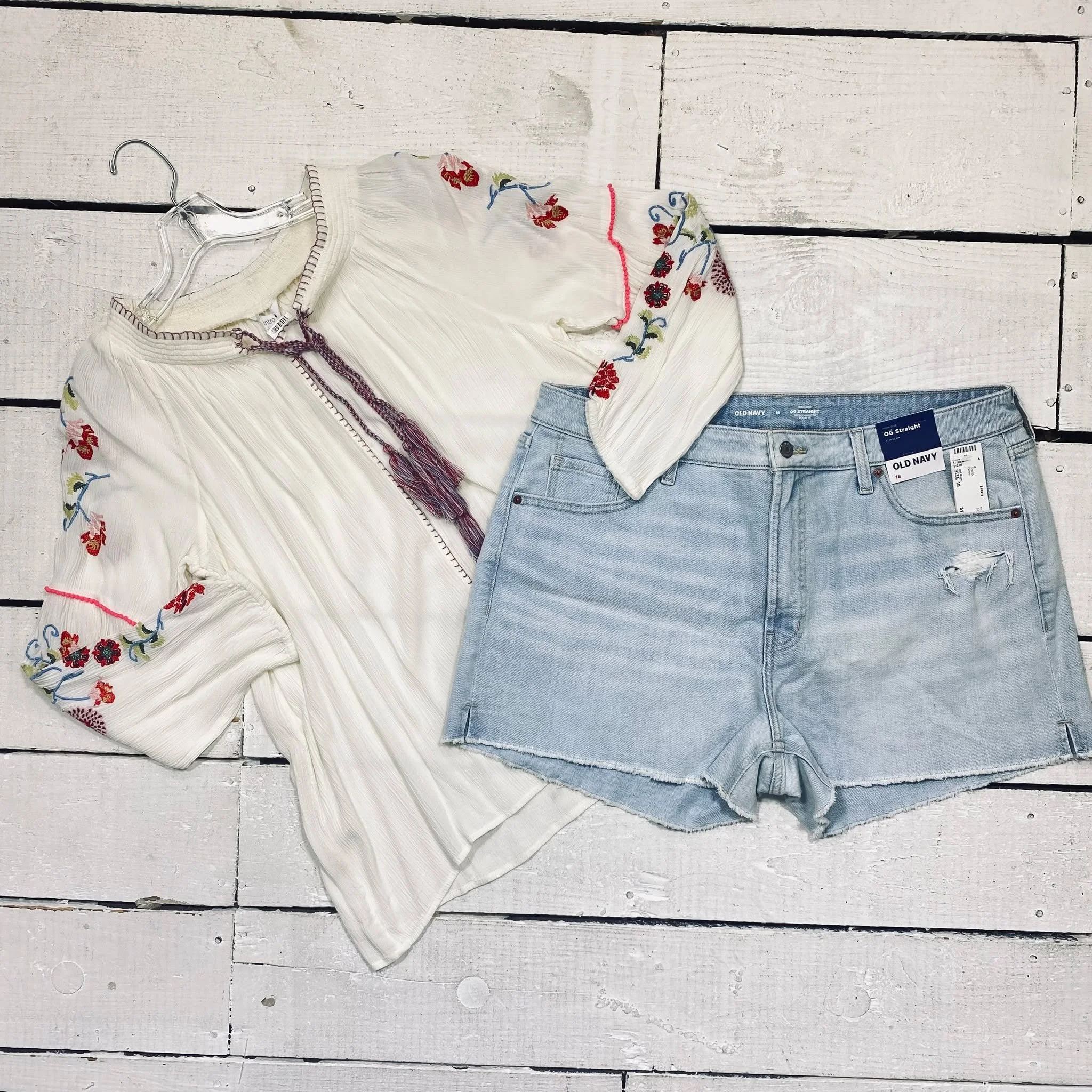 Intro Top Size XLP, $14.95
Old Navy Shorts Size 18, $12.95