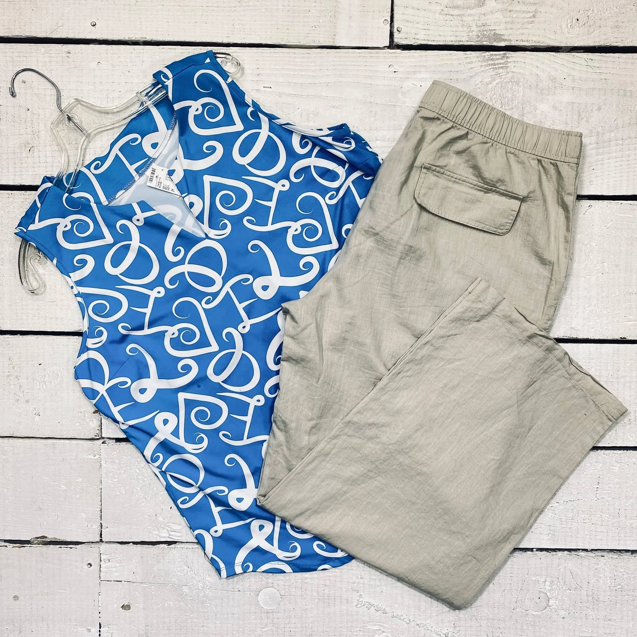 Lulu B Shell Size XL, $15.95
Zara Pants Size 16, $15.95