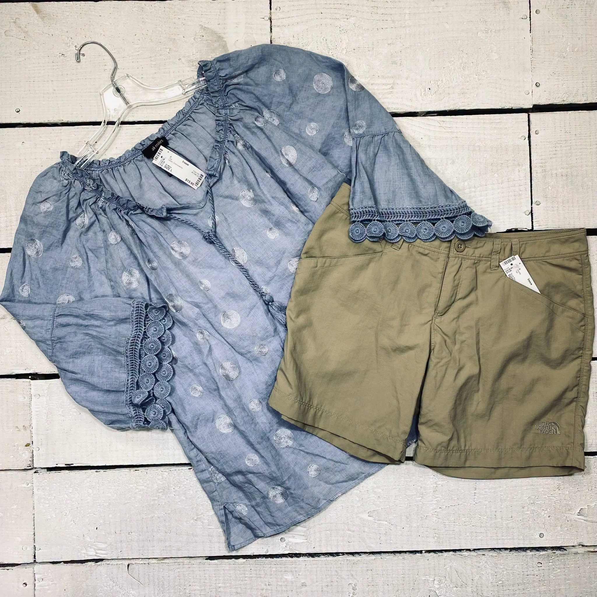 Ali Miles Top Size L, $15.95
North Face Short Size 8, $10.95