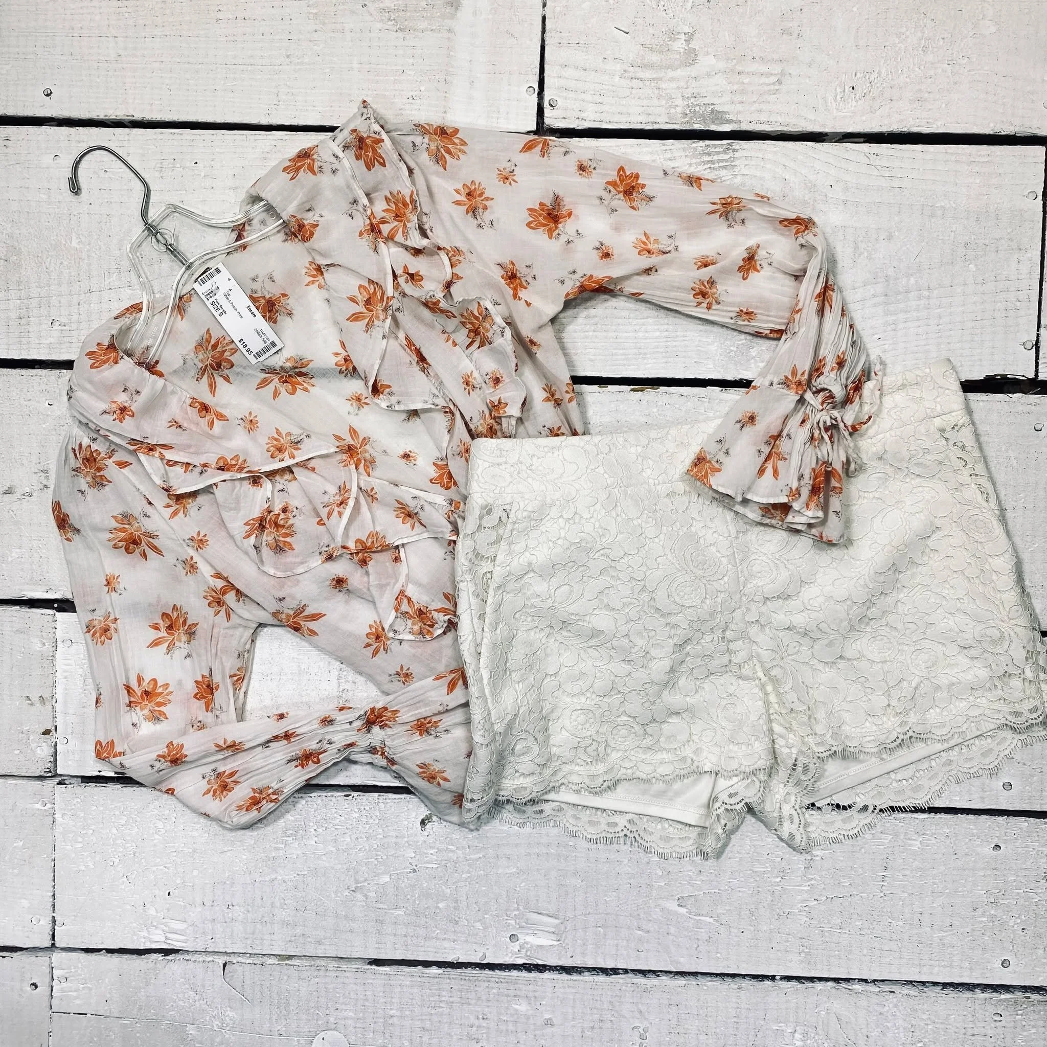 Free People Top Size S, $18.95
Express Shorts Size 6, $10.95