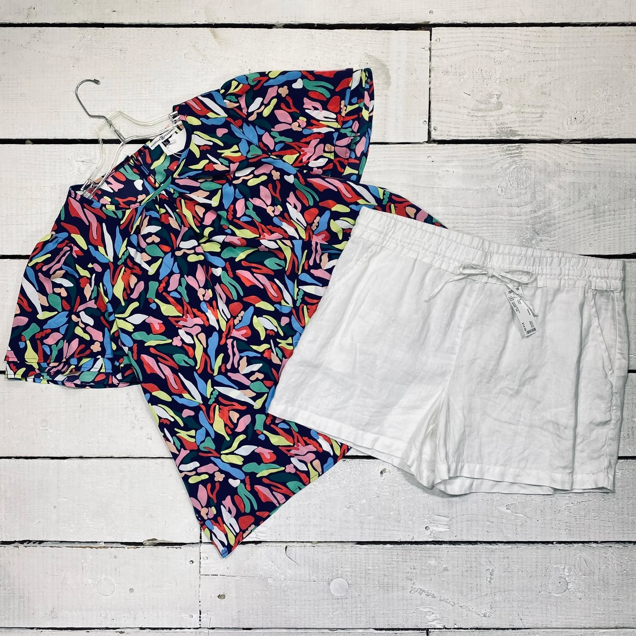 Michelle McDowell Top Size XL, $12.95
Tommy Bahama Shorts Size 14, $14.95