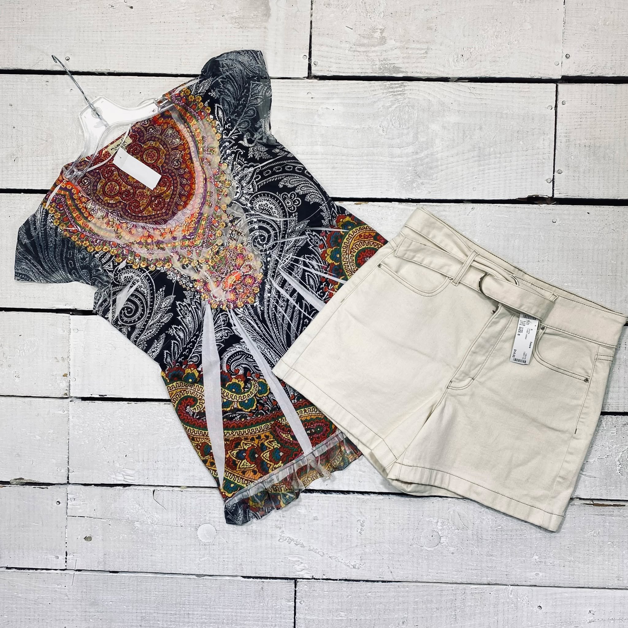 One World Top Size M, $12.95
WHBM Shorts Size 8, $14.95
