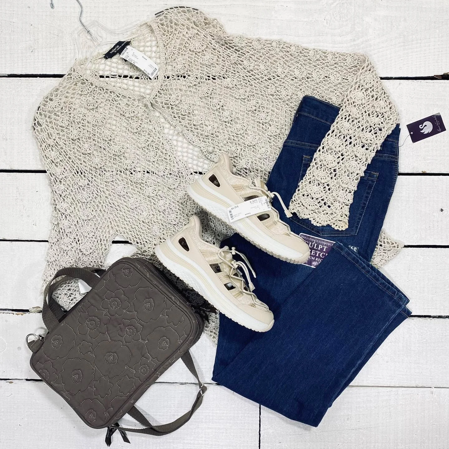 Valerie Stevens Cardigan Size XL, $15.99
Gloria Vanderbilt Jeans Size 16P, $14.99
Ortho Feet Tennis Size 8, $32.99
Vera Bradley Makeup Bag, $15.99