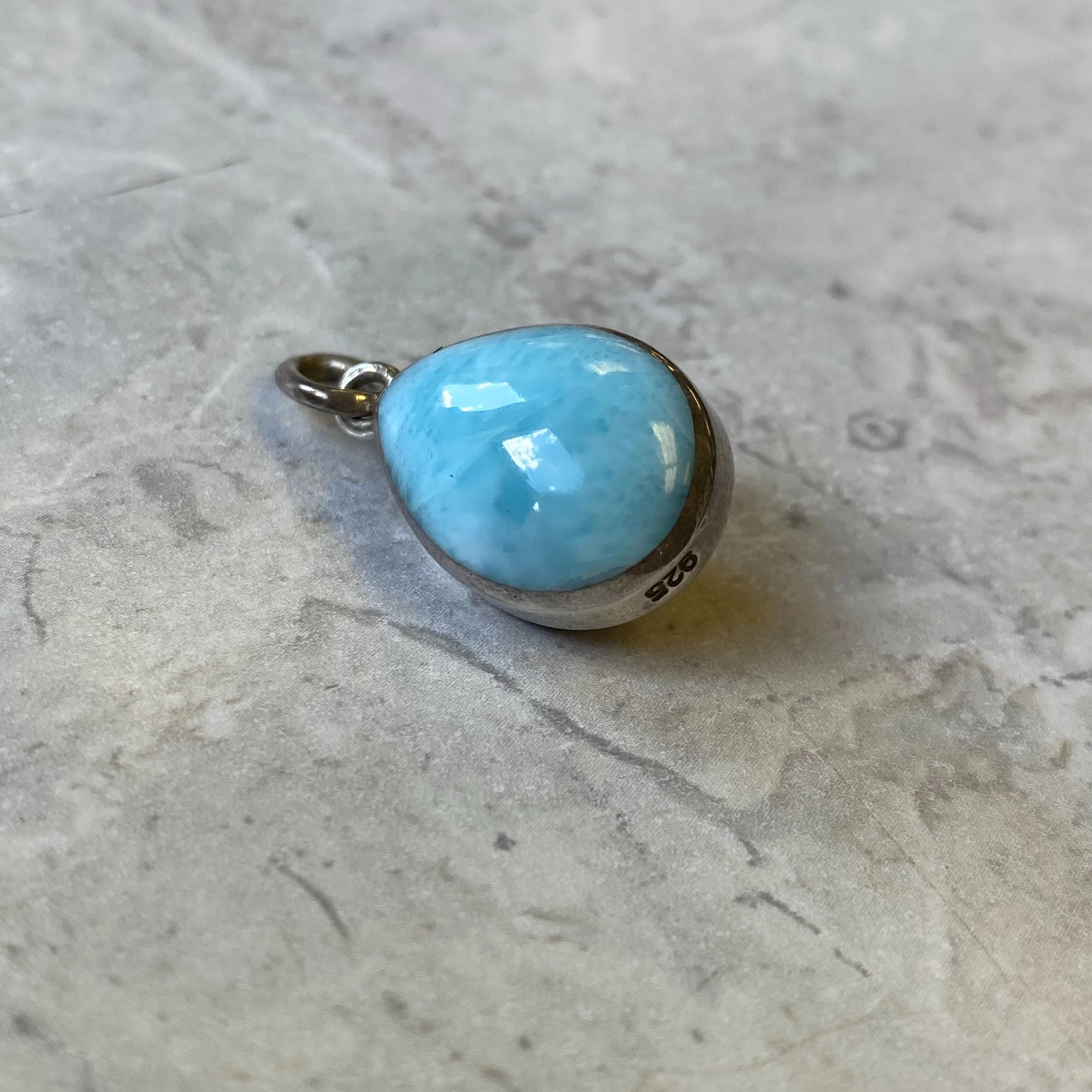 How cool is this! Double sided sterling pendant with one side Amber, the other Larimar! 🤎🩵 Only $38.99! ✨