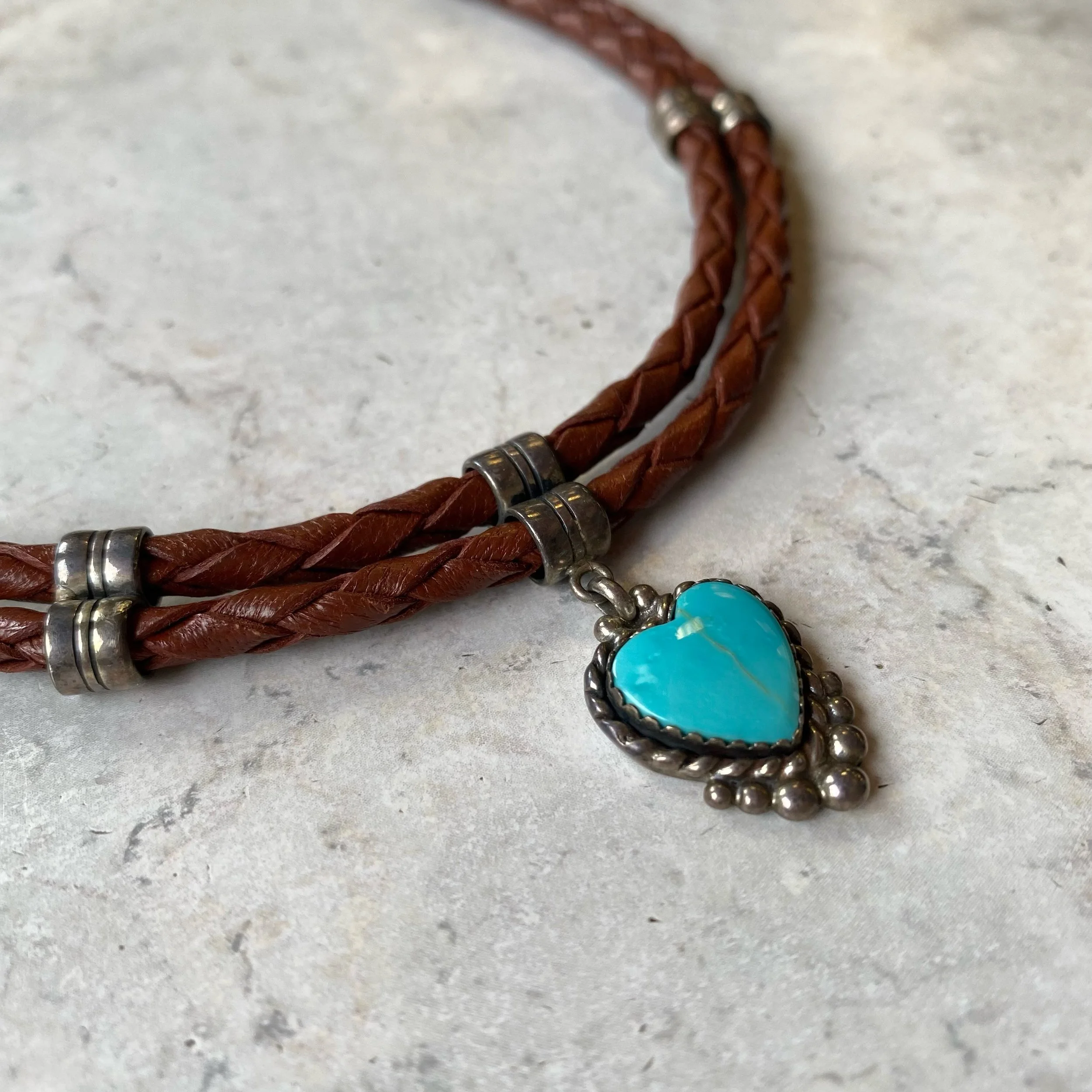 Check this out!! Cutest sterling and turquoise heart pendant on braided leather cord! Only $45.99! 🩵