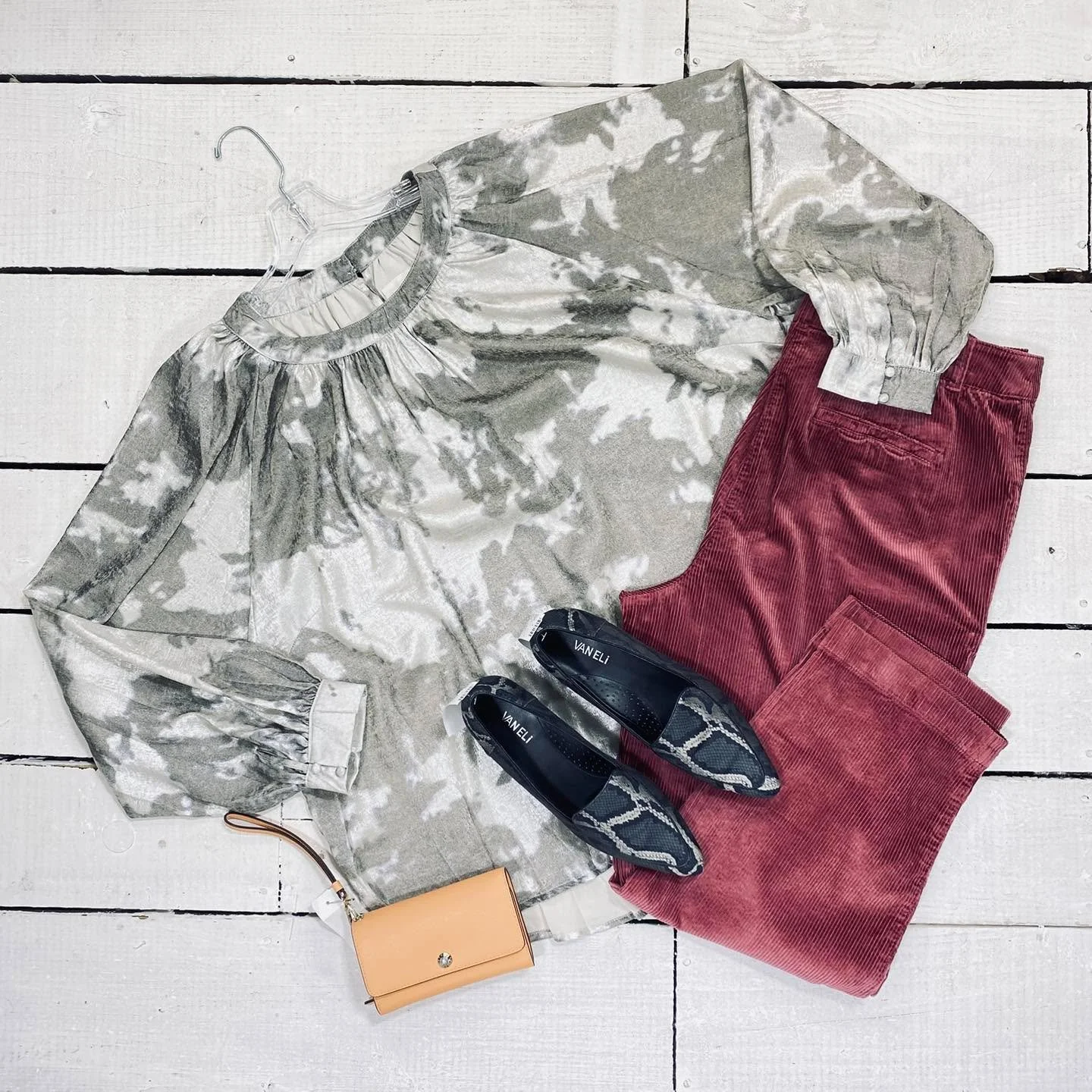 Umgee Top Size XL, $16.99
Talbots Pants Size 16, $22.99
Vaneli Flats Size 10, $28.99
Henri Bendel Wallet, $24.95
