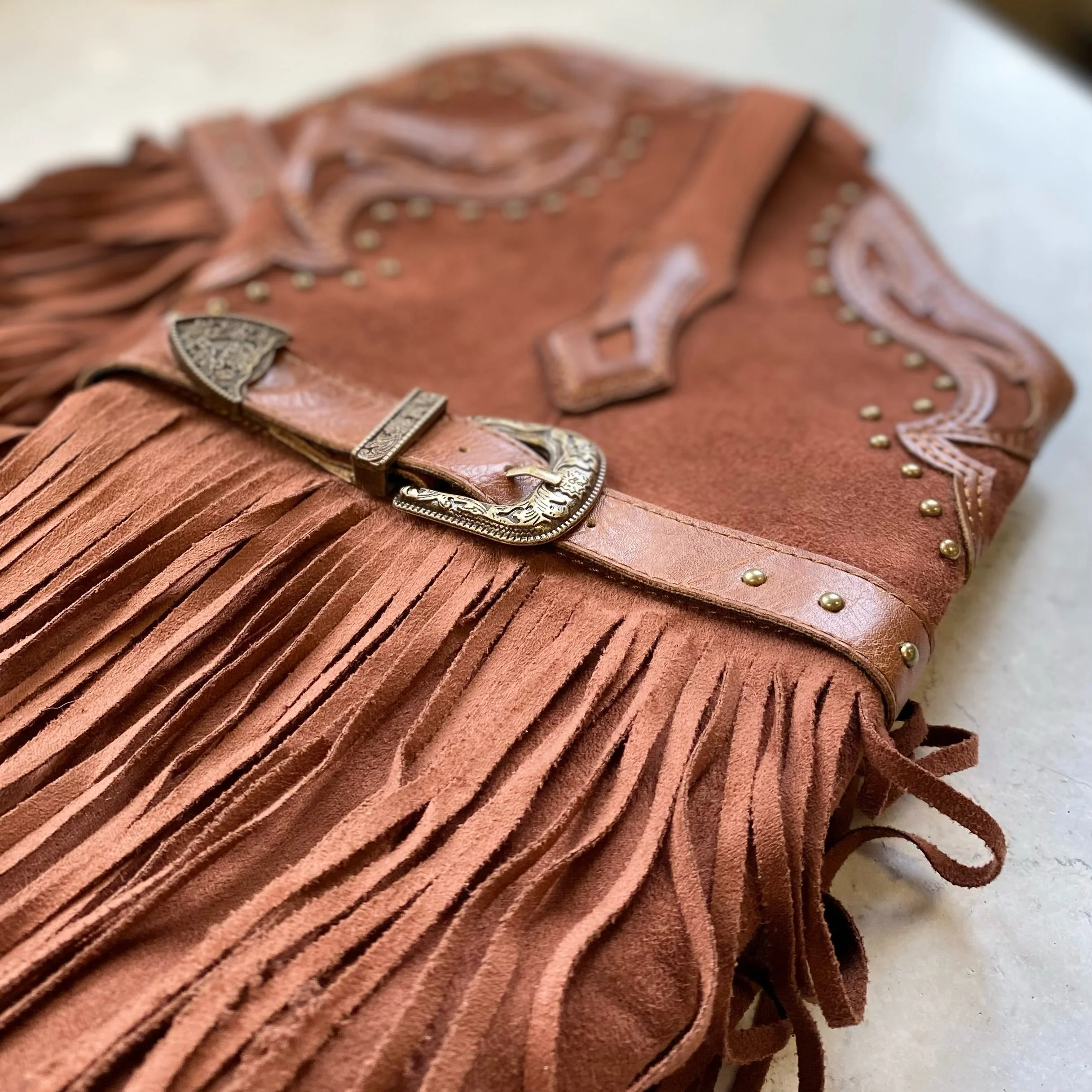 CUTEST Cowboy Boots with this cool studded strap! Fringe GALOR and perfect for today&rsquo;s weather, size 8.5 and only $35.99! 🤎✨