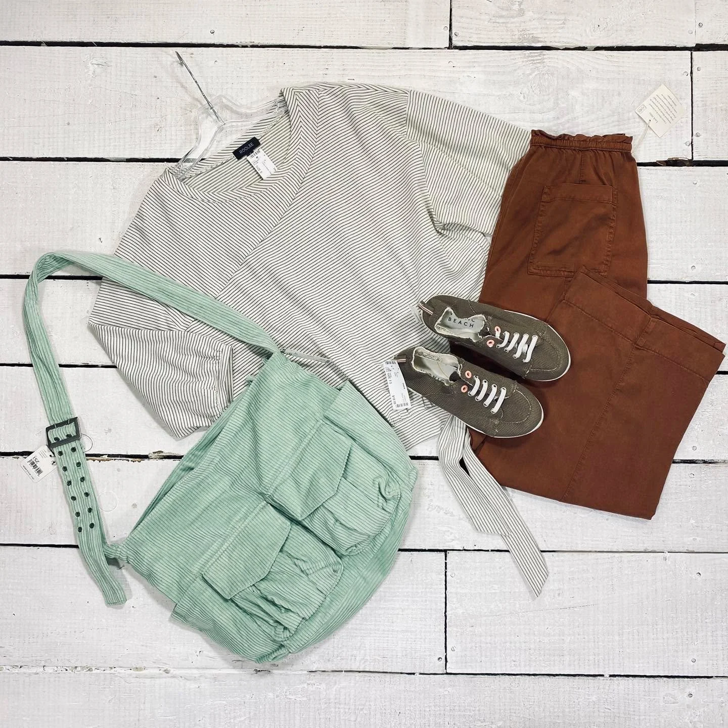 Top Size S, $12.99
Joie Pants Size 10, $16.99
Vionic Tennis Size 7.5, $18.99
Free People Bag, $35.95