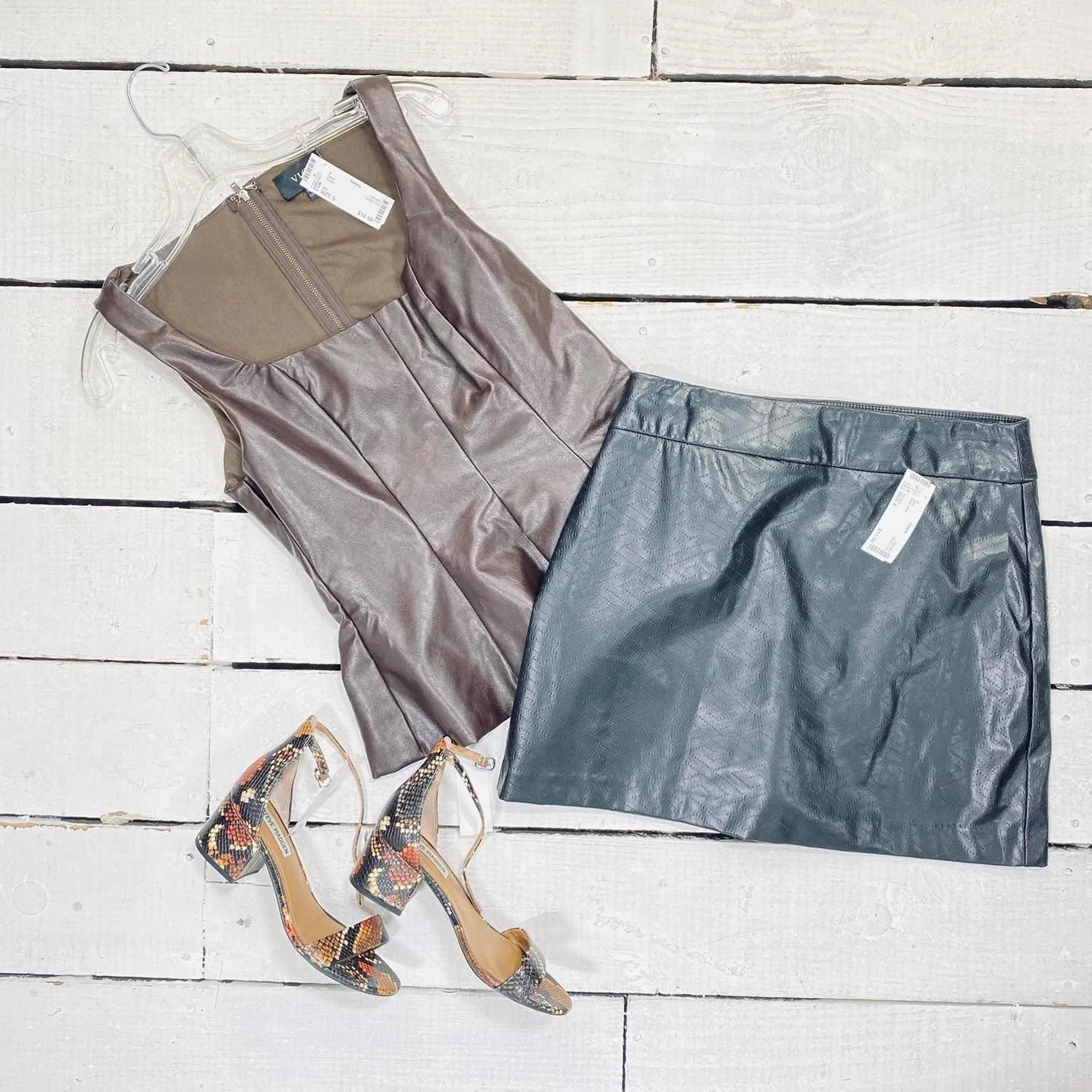 VICI Shell Size S, $18.99
Versona Skirt Size 6, $11.99
Steve Madden Pumps Size 7, $18.95