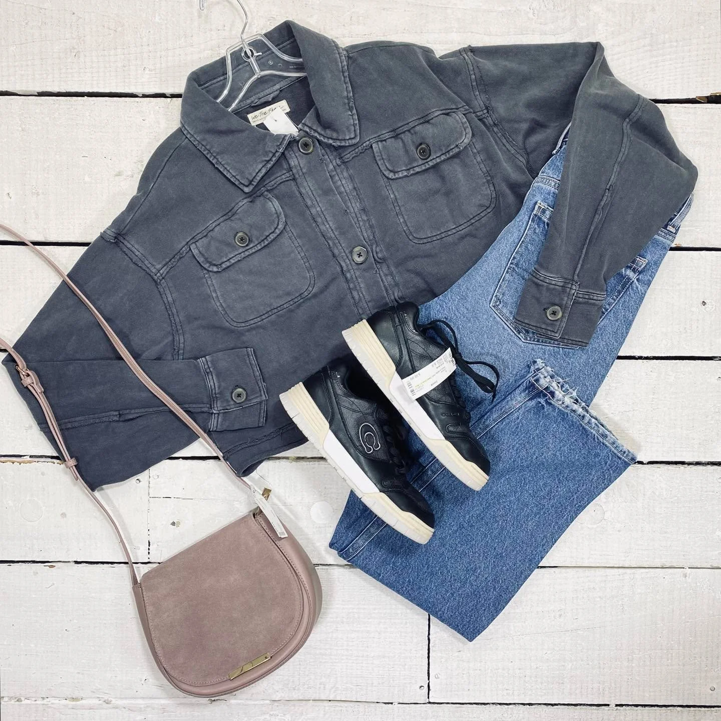 We The Free Cardigan Size S, $28.99
American Eagle Jeans Size 6, $18.95
Coach Tennis Size 8.5, $38.99
Madison West Crossbody, $18.99