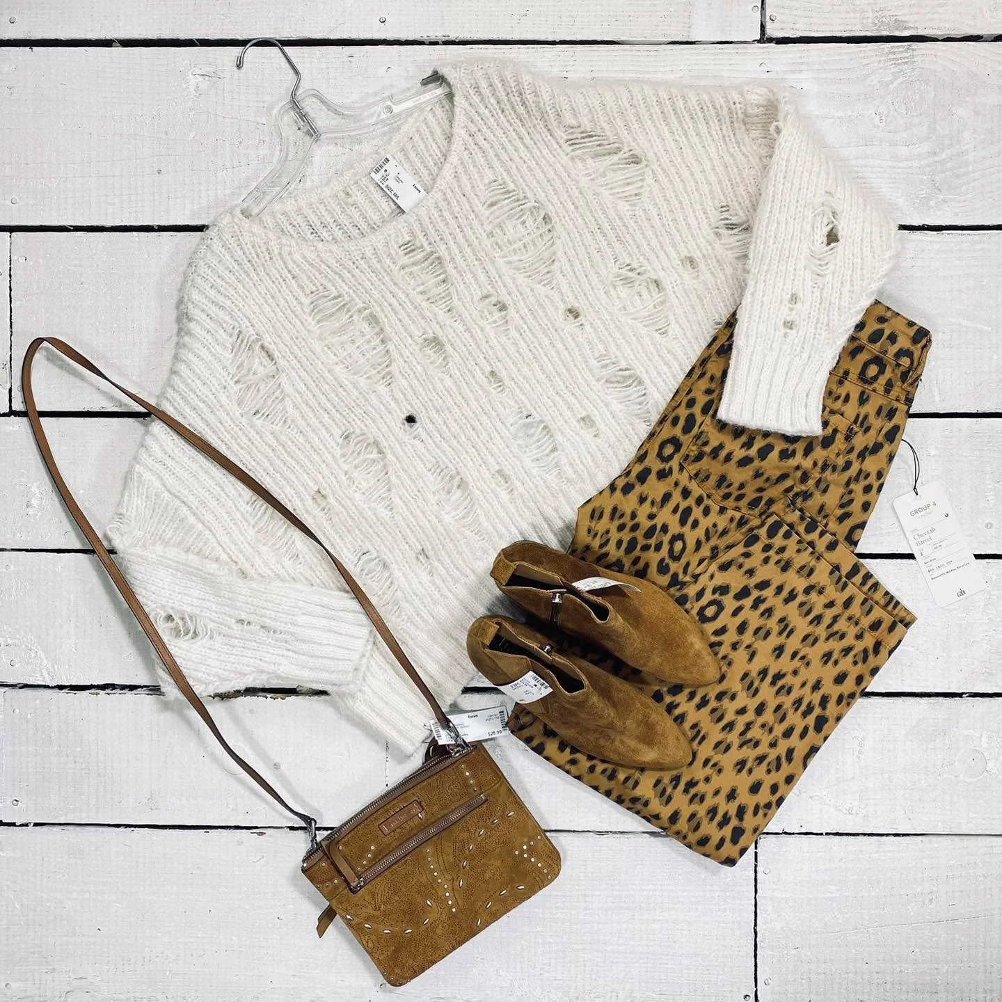 Sweater Size M/L, $15.99
Cabi Pants Size 2, $42.99
Vera Bradley Crossbody, $28.99
Franco Sarto Pumps Size 8, $25.99