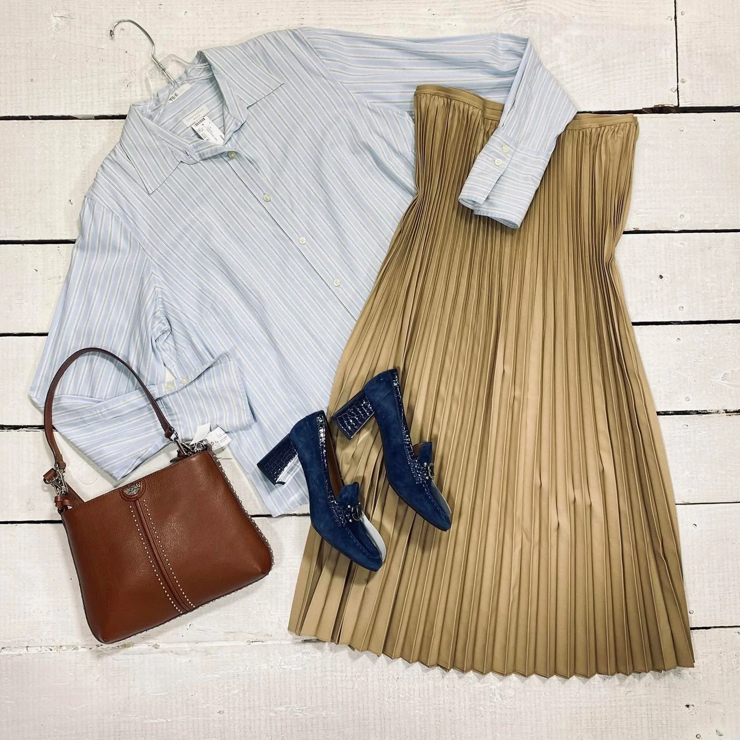 Charter Club Blouse Size XL, $12.99
Eileen Fisher Skirt Size L, $64.99
Donald Pliner Pumps Size 8, $58.99
Brighton Purse, $114.99