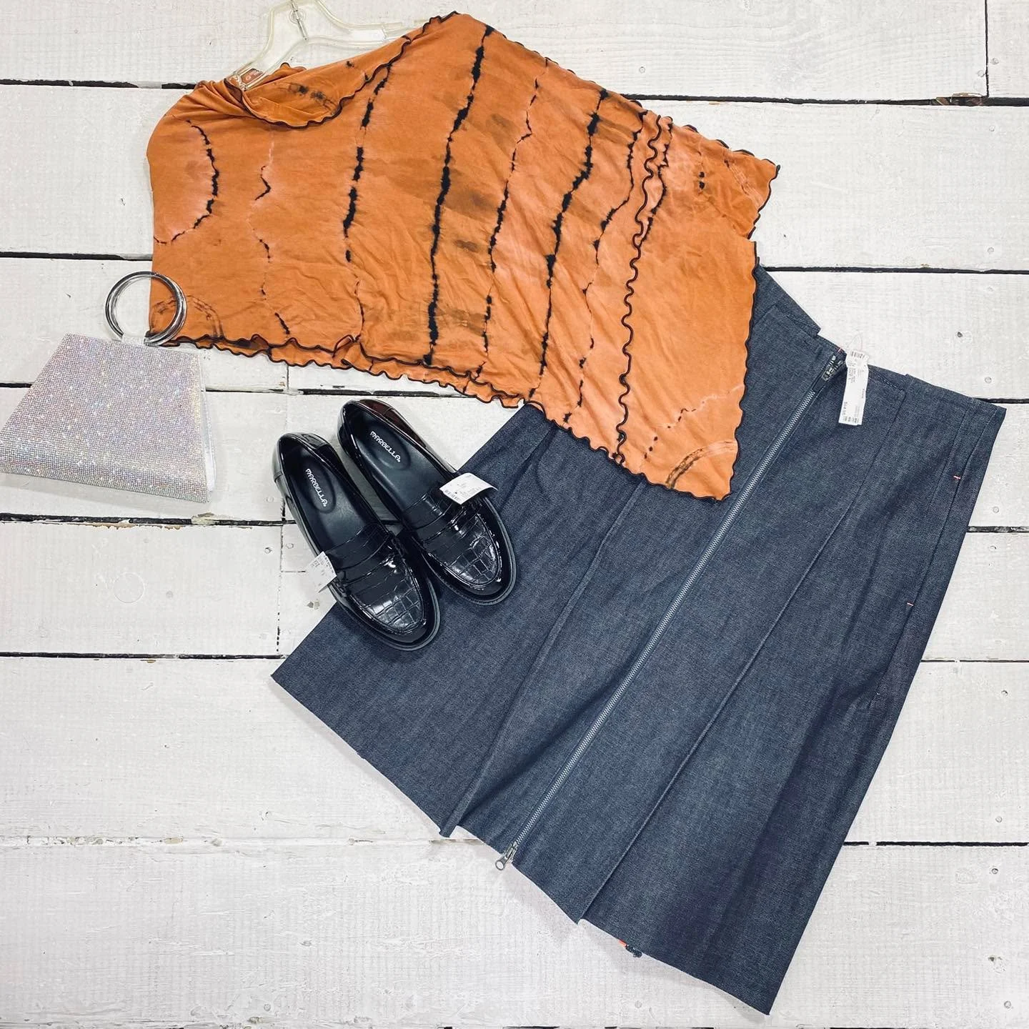 Top Size S, $14.99
Sweaty Betty Skirt Size L, $64.95
Marbella Loafers Size 8.5, $22.99
Evening Bag, $14.99