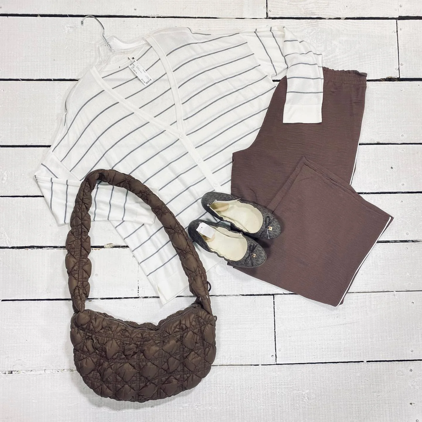 Cardigan Size XL, $13.99
Chloe + Jasmine Pants Size 16, $18.95
Michael Kors Flats Size 8.5, $25.95
Purse, $12.99