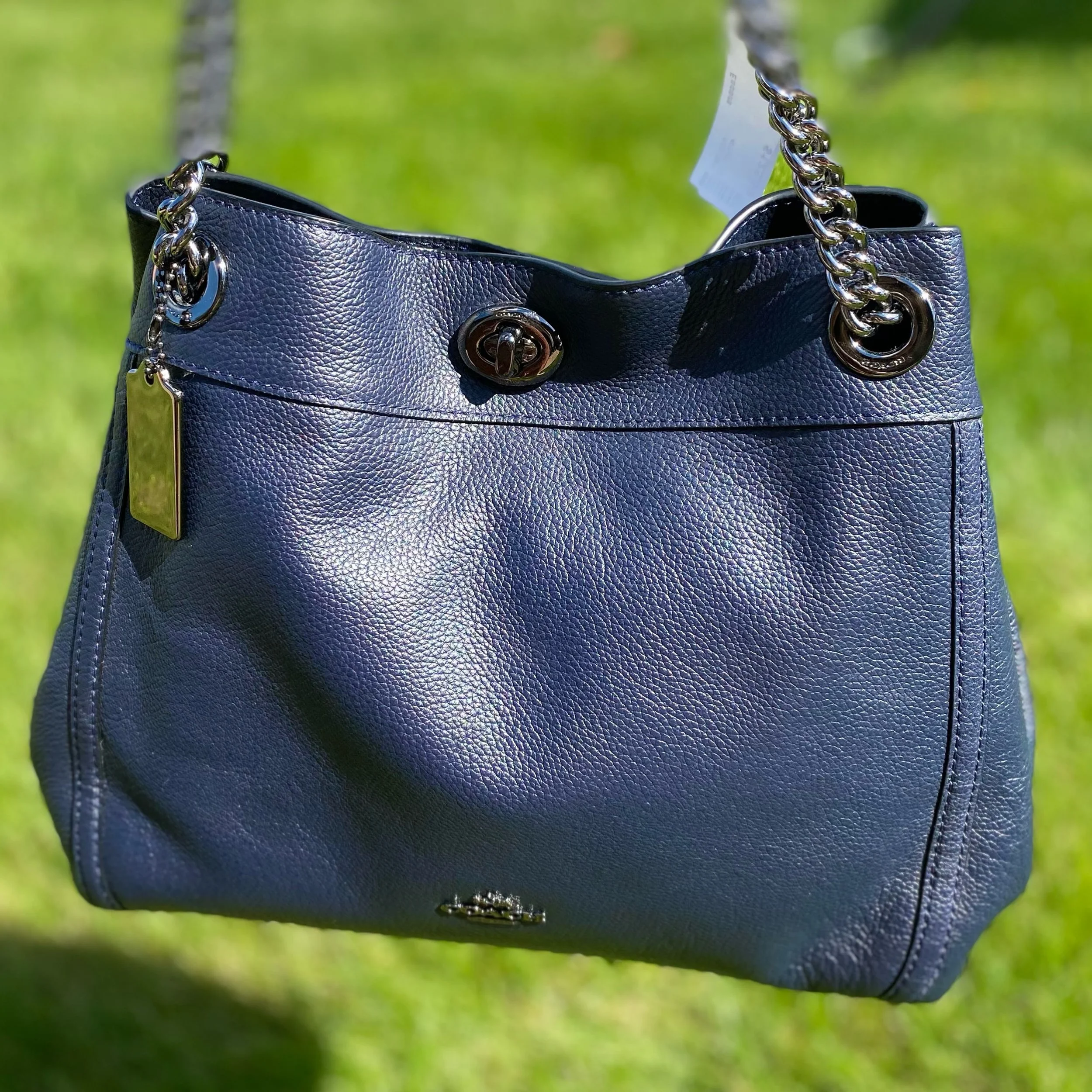 Gorgeous Midnight Navy Coach Bag with metallic hardware is the PERFECT combo! $125.99! 💙