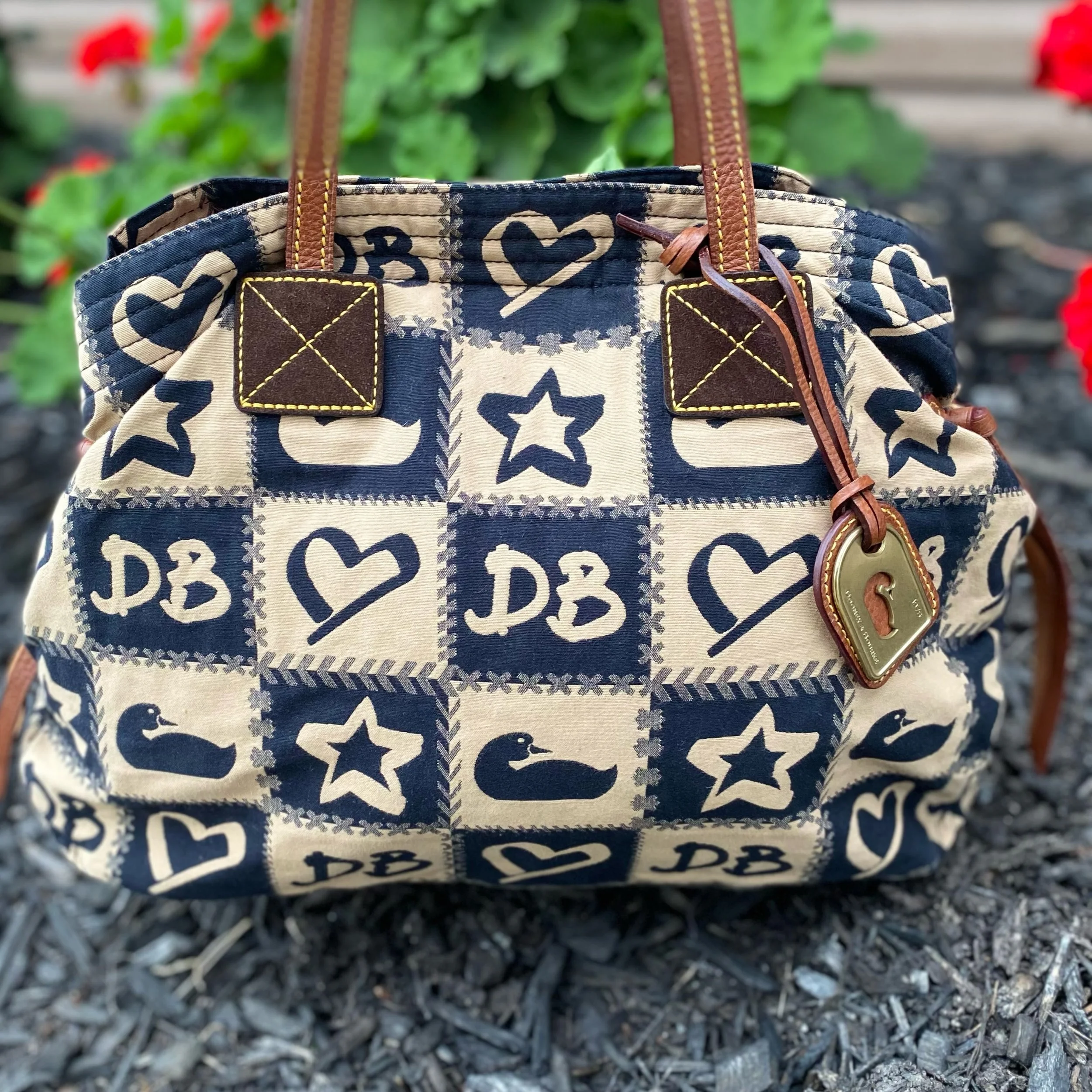 How ADORABLE is this Dooney!? So cute and so fresh, only $65.99! ⭐️