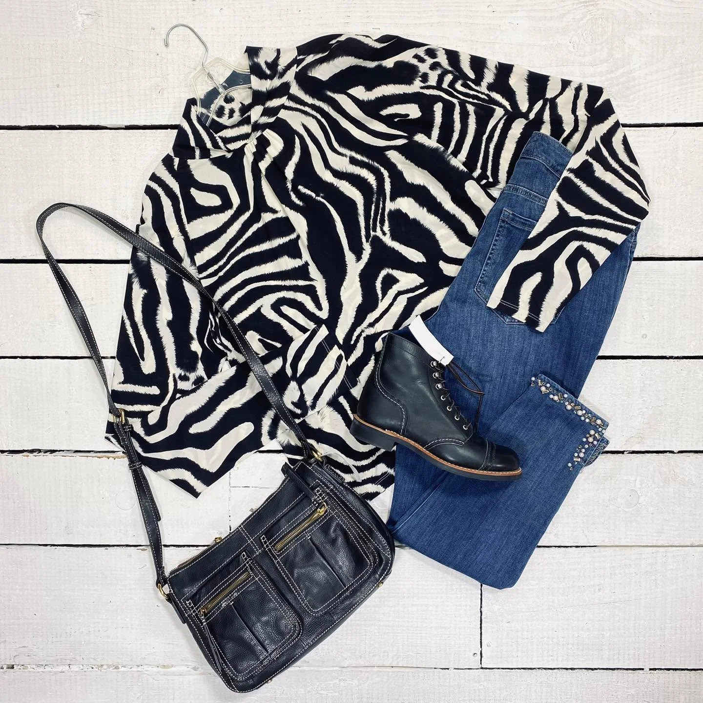 St John Top Size XL, $62.99
Lane Bryant Jeans Size 16, $15.99
American Leather Purse, $38.99
Red Wing Ankle Boots Size 7, $58.99