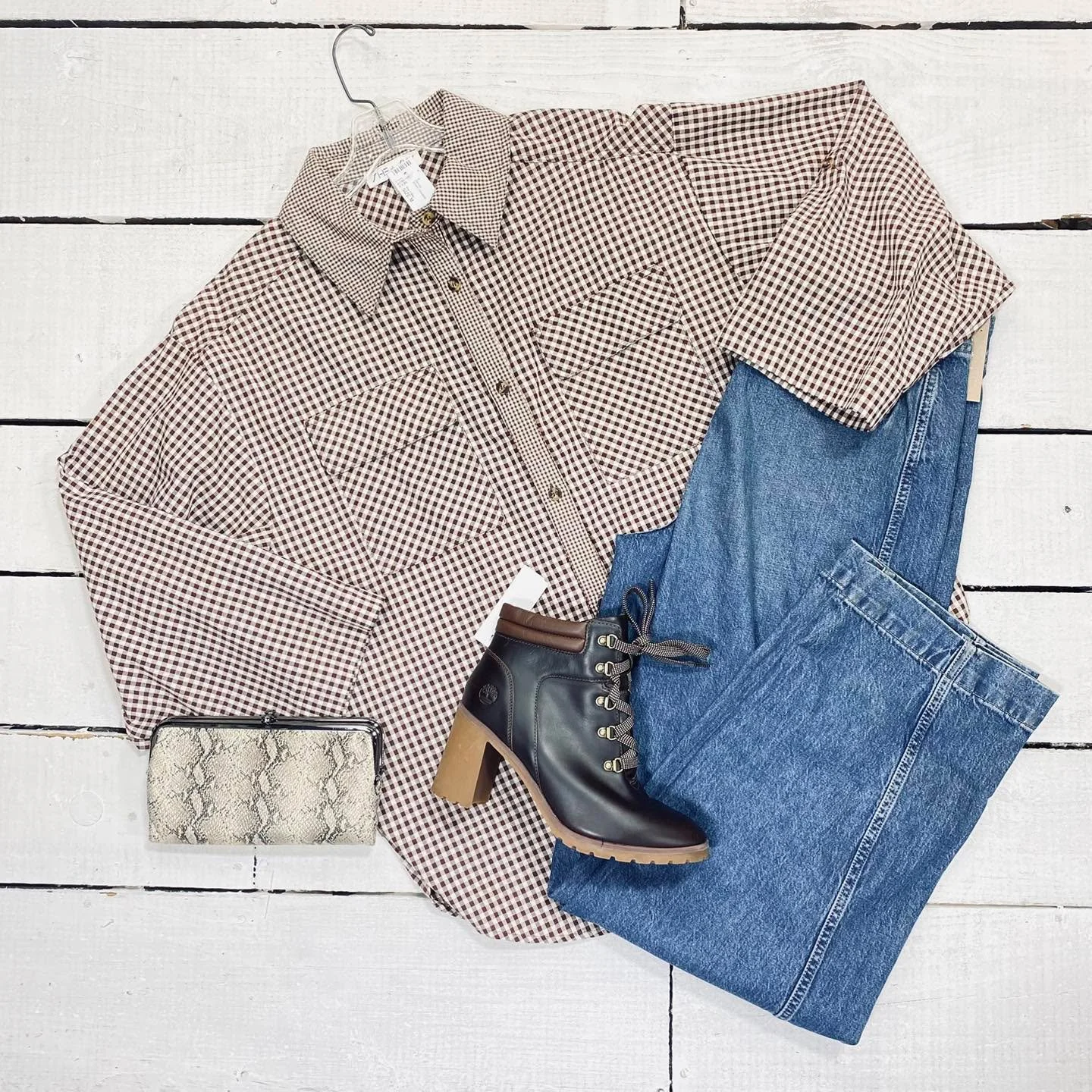 She + Sky Blouse Size M, $14.99
Madewell Jeans Size 5, $42.99
Timberland Ankle Boots Size 9.5, $40.99
Hobo Clutch, $40.99
