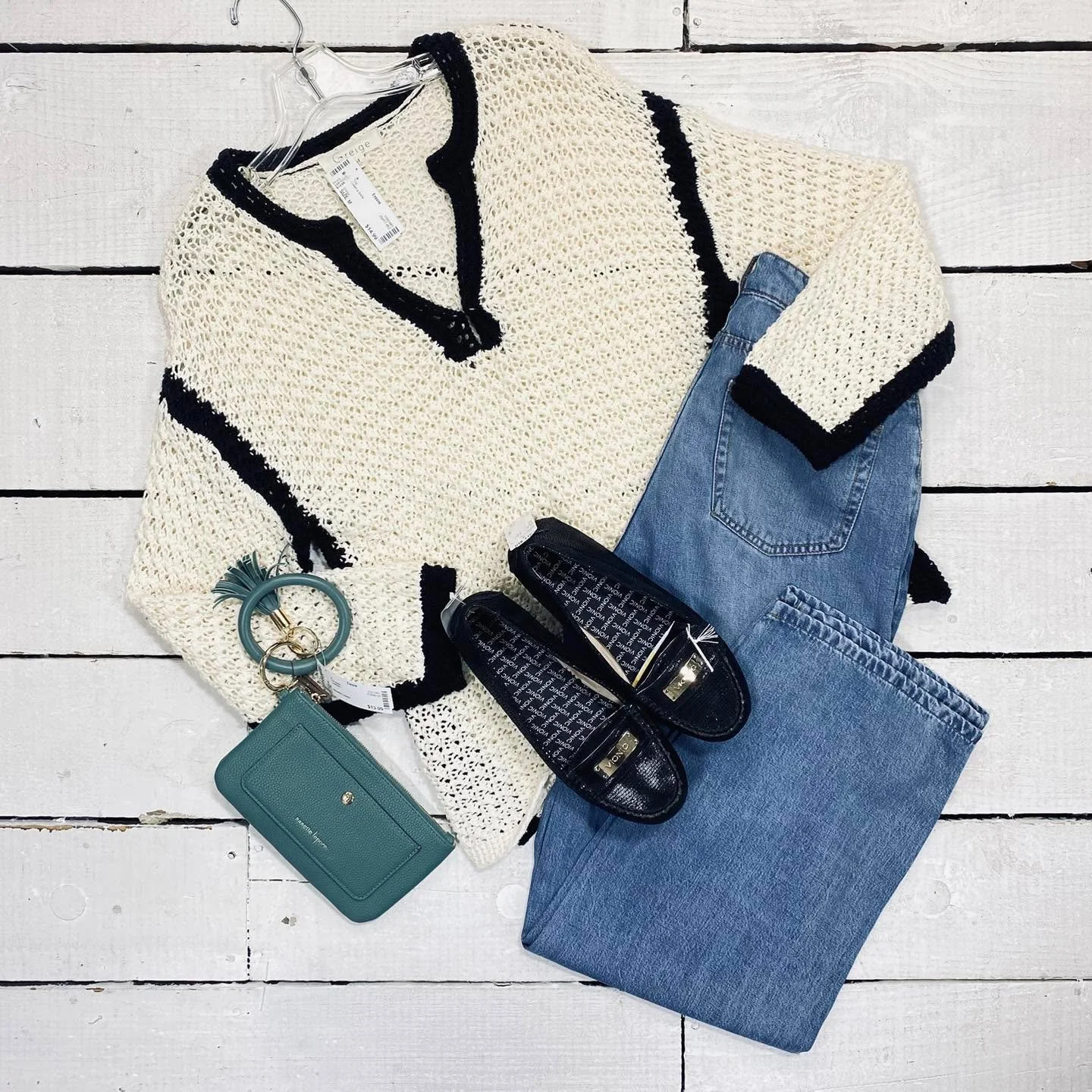 Greige Top Size M, $14.99
Oltre Jeans Size 6, $42.99
Nanette Lepore Wristlet, $13.99
Vionic Flats Size 8, $30.95
