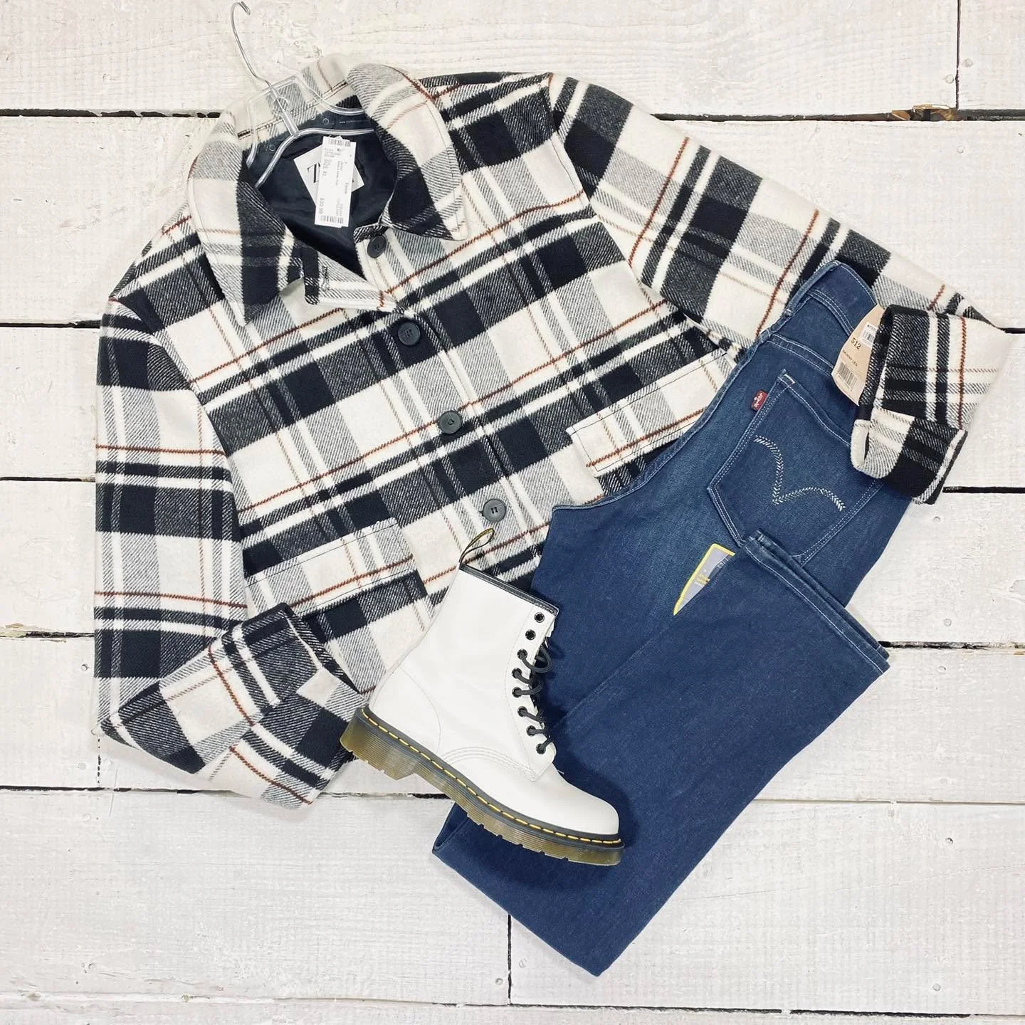 Zara Jacket Size XL, $30.99
Levi&rsquo;s Jeans Size 8, $19.99
Doc Marten Ankle Boots Size 7, $45.99