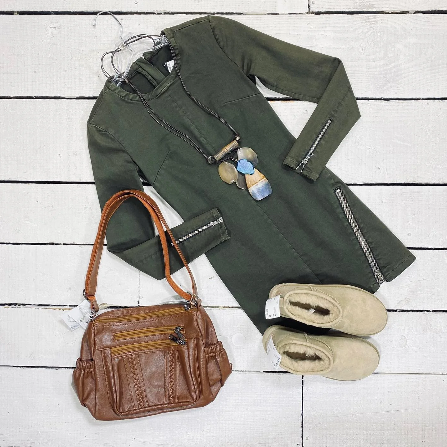 Dress Size 2, $22.99
Ugg Ankle Boot Size 7, $65.99
Elda Purse, $22.99
Necklace, $13.99
