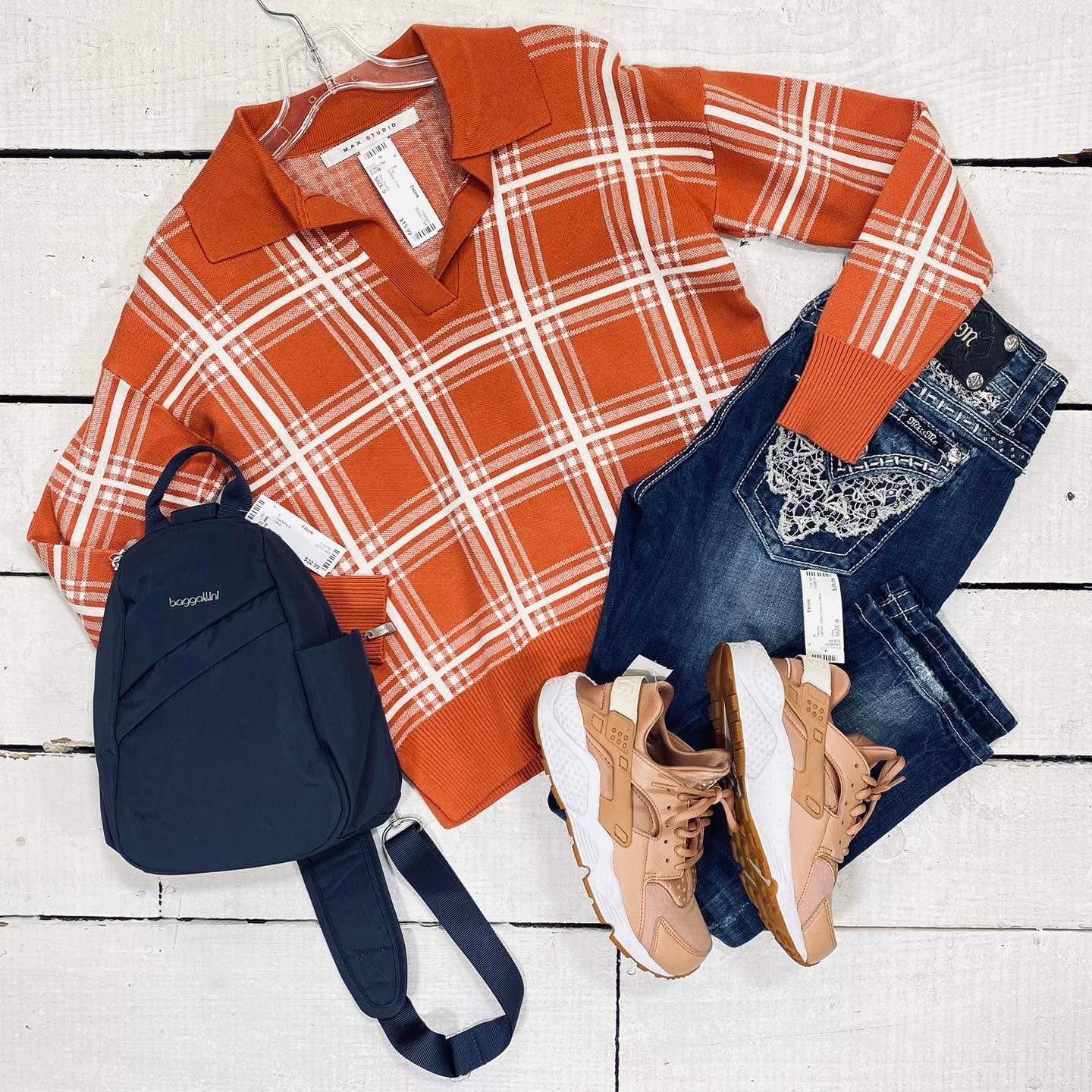 Max Studio Top Size S, $15.99
Miss Me Jeans Size 5, $35.95
Nike Tennis Size 8, $38.99
Baggallini Backpack, $32.99