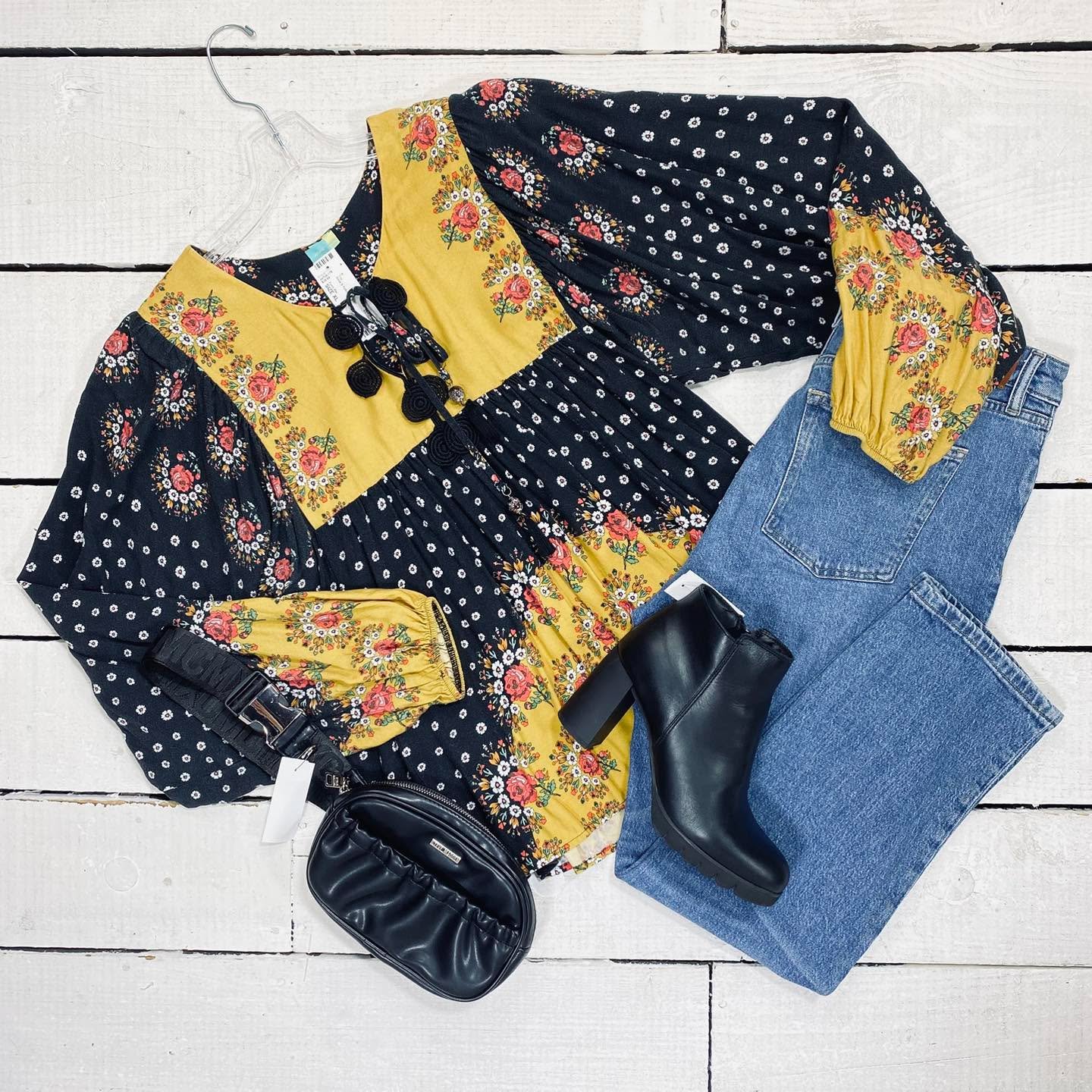 Farm Rio Top Size XL, $28.99
Ralph Lauren Jeans Size 14, $22.99
Steve Madden Fanny Pack, $14.99
La Canadienne Ankle Boot Size 9, $85.99